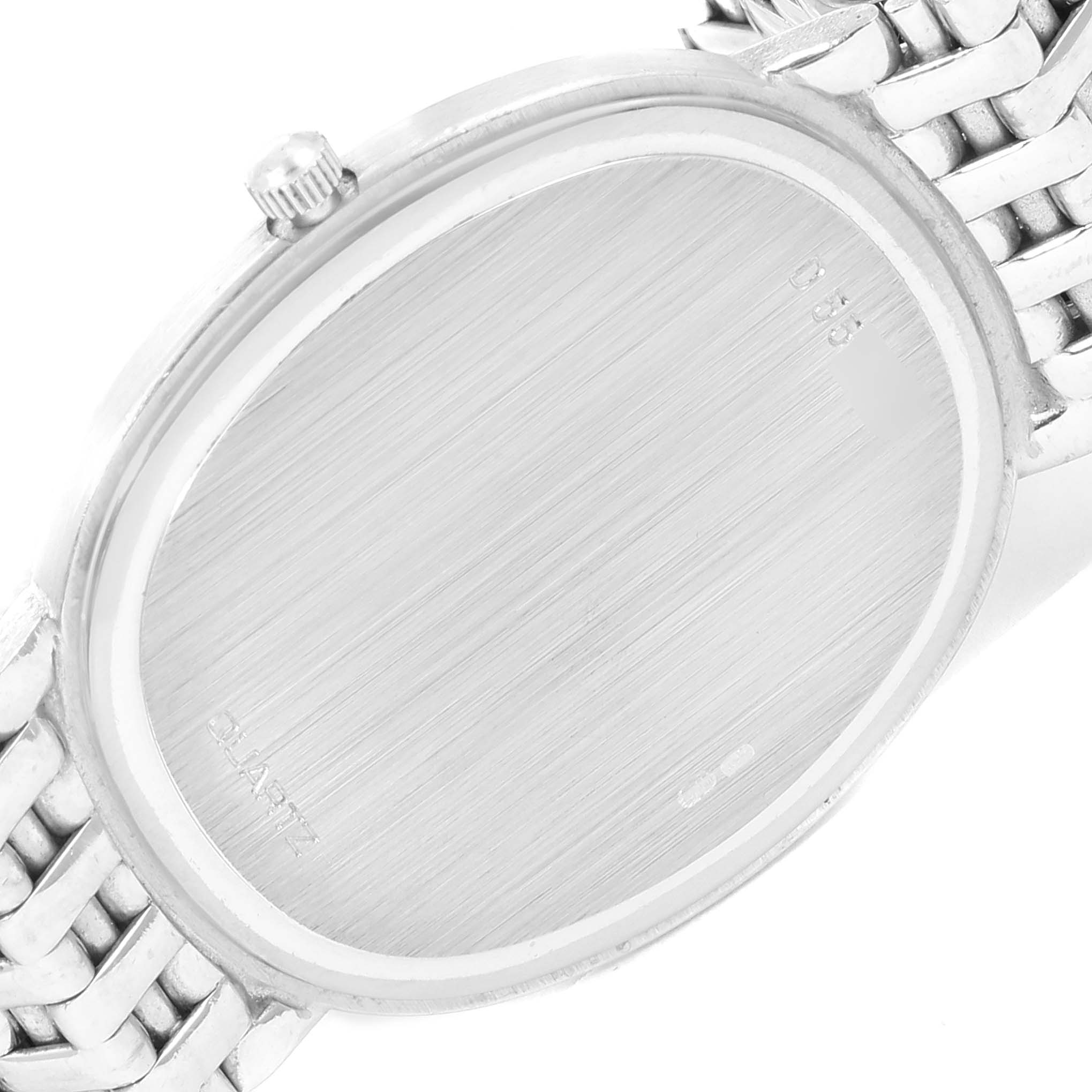 This image shows the back case and part of the bracelet of a Vintage Audemars Piguet watch from a slightly angled top view.