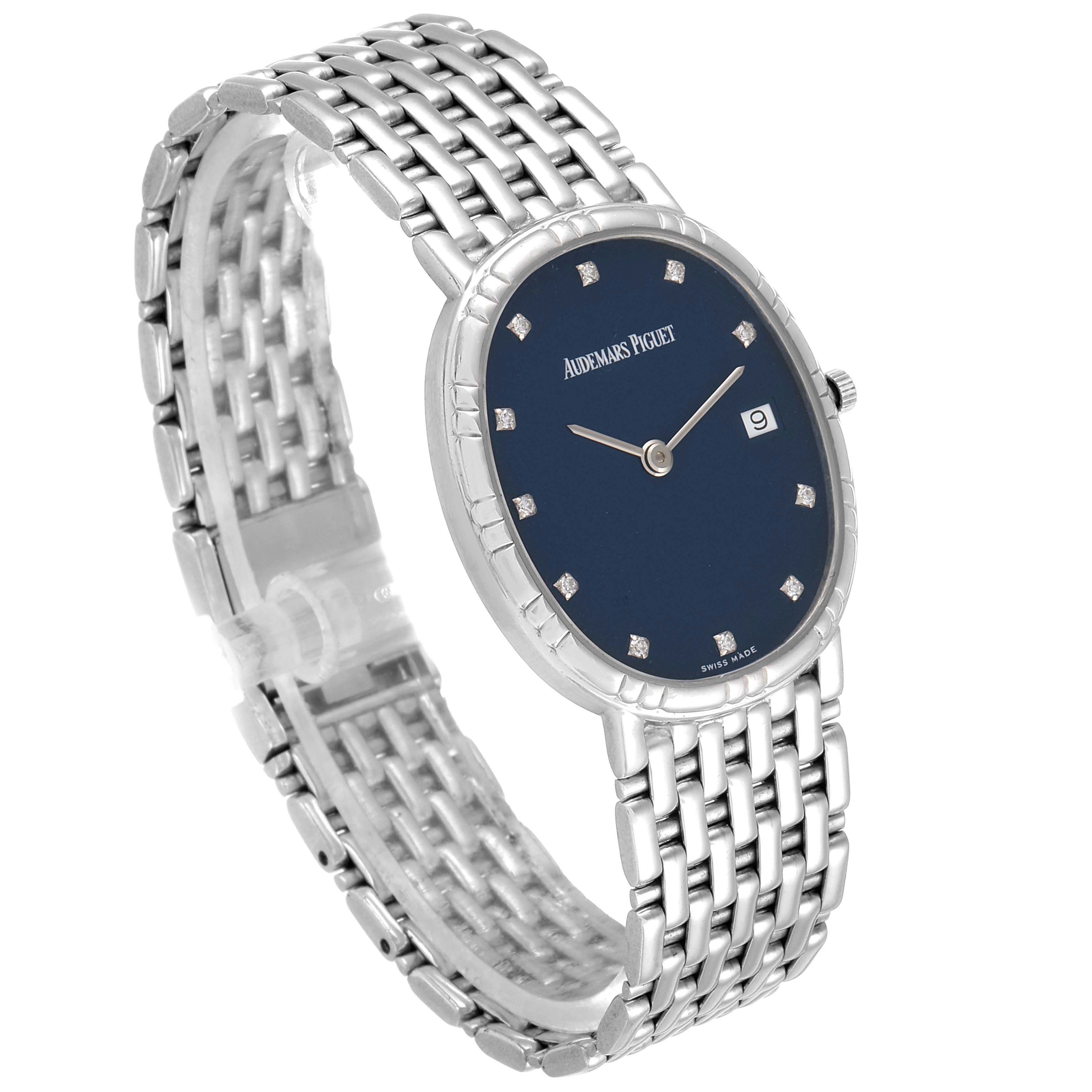 This image shows a side angle of a Vintage Audemars Piguet watch, displaying its face, bezel, hands, and metal bracelet.