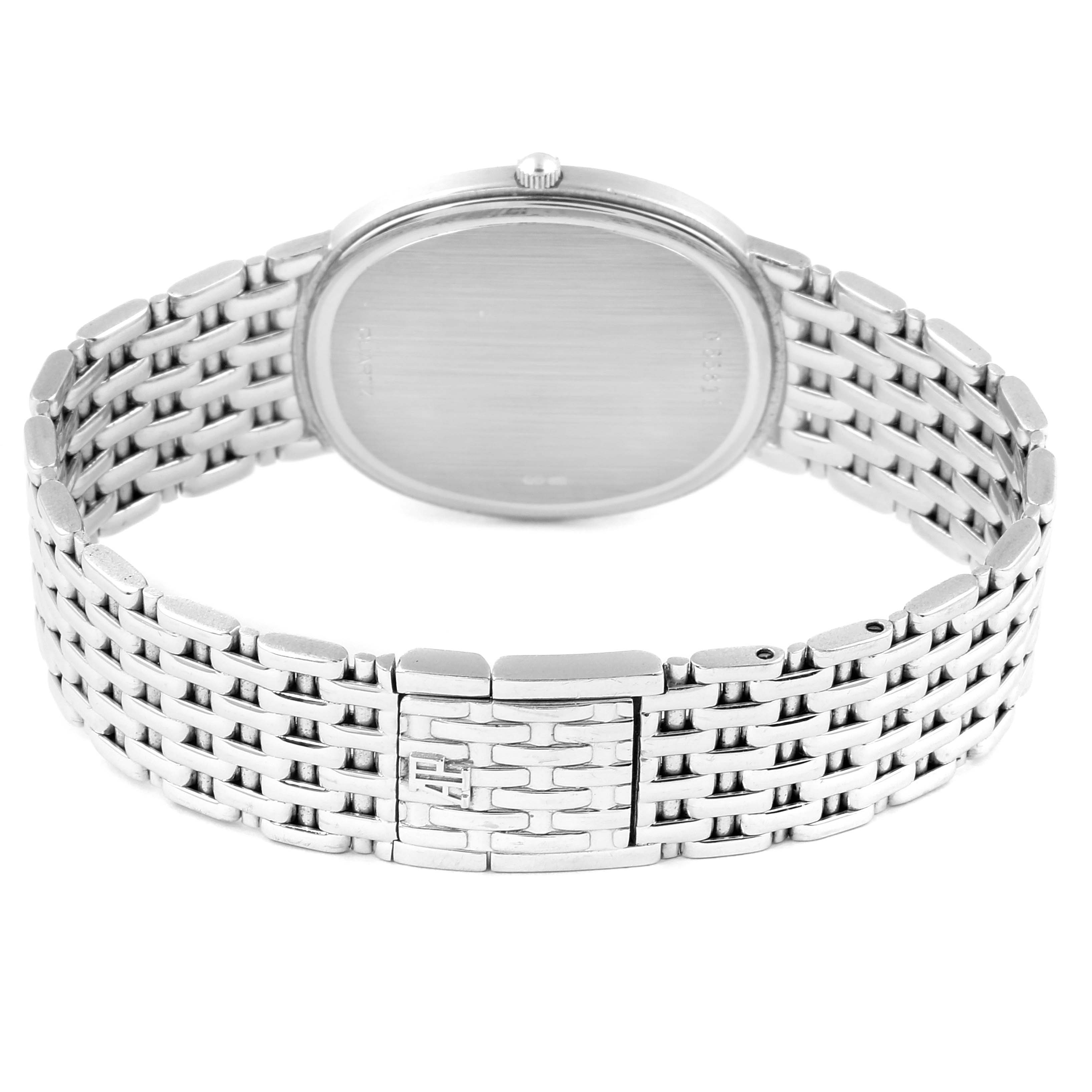 The image shows the back view of a Vintage Audemars Piguet watch, highlighting its case back and metal bracelet.