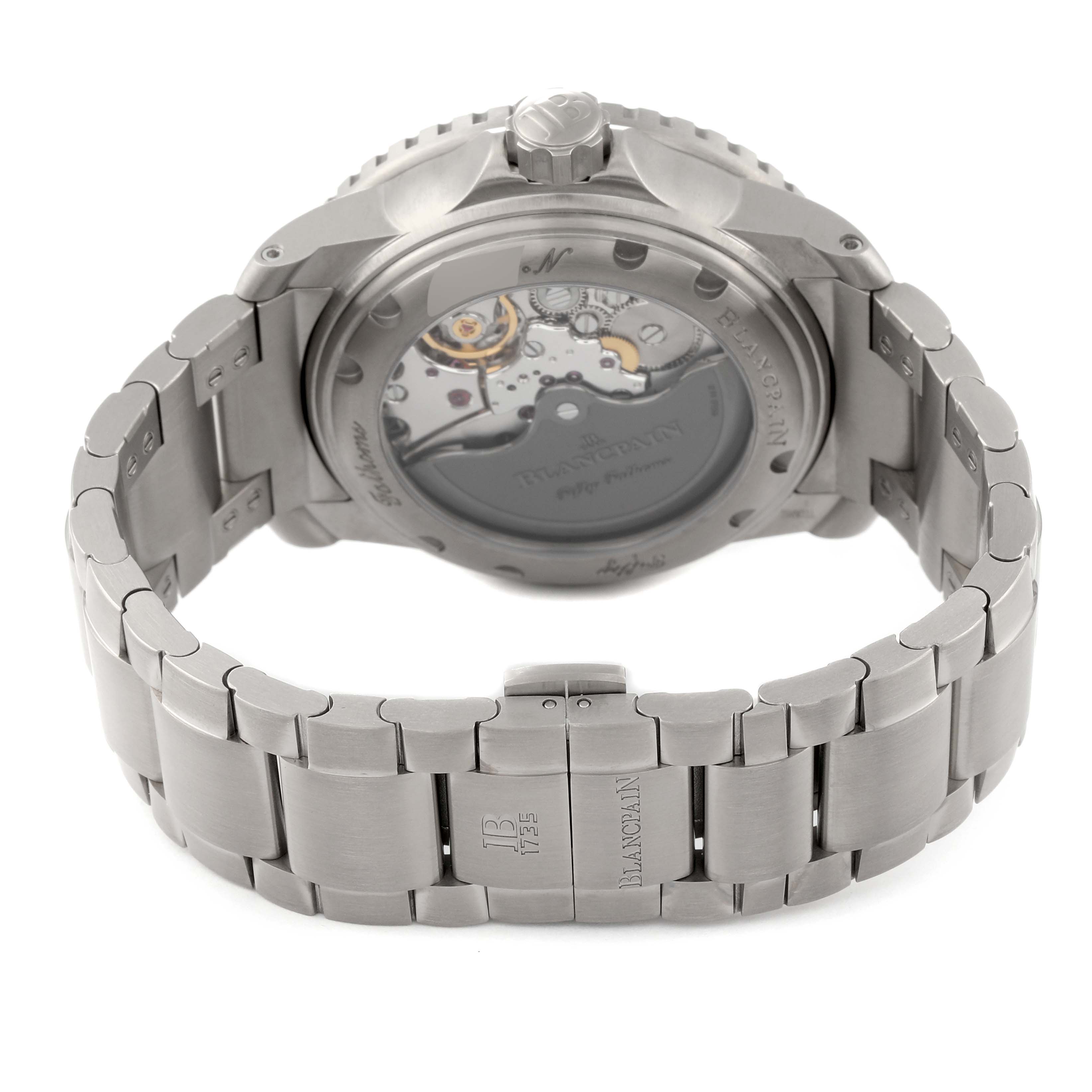 The image shows the rear angle of the Blancpain Fifty Fathoms 5015-12B40-052A Men's Titanium Blue Dial 5015-12B40-052A Men's Titanium Blue Dial watch, highlighting its open case back and metal bracelet.