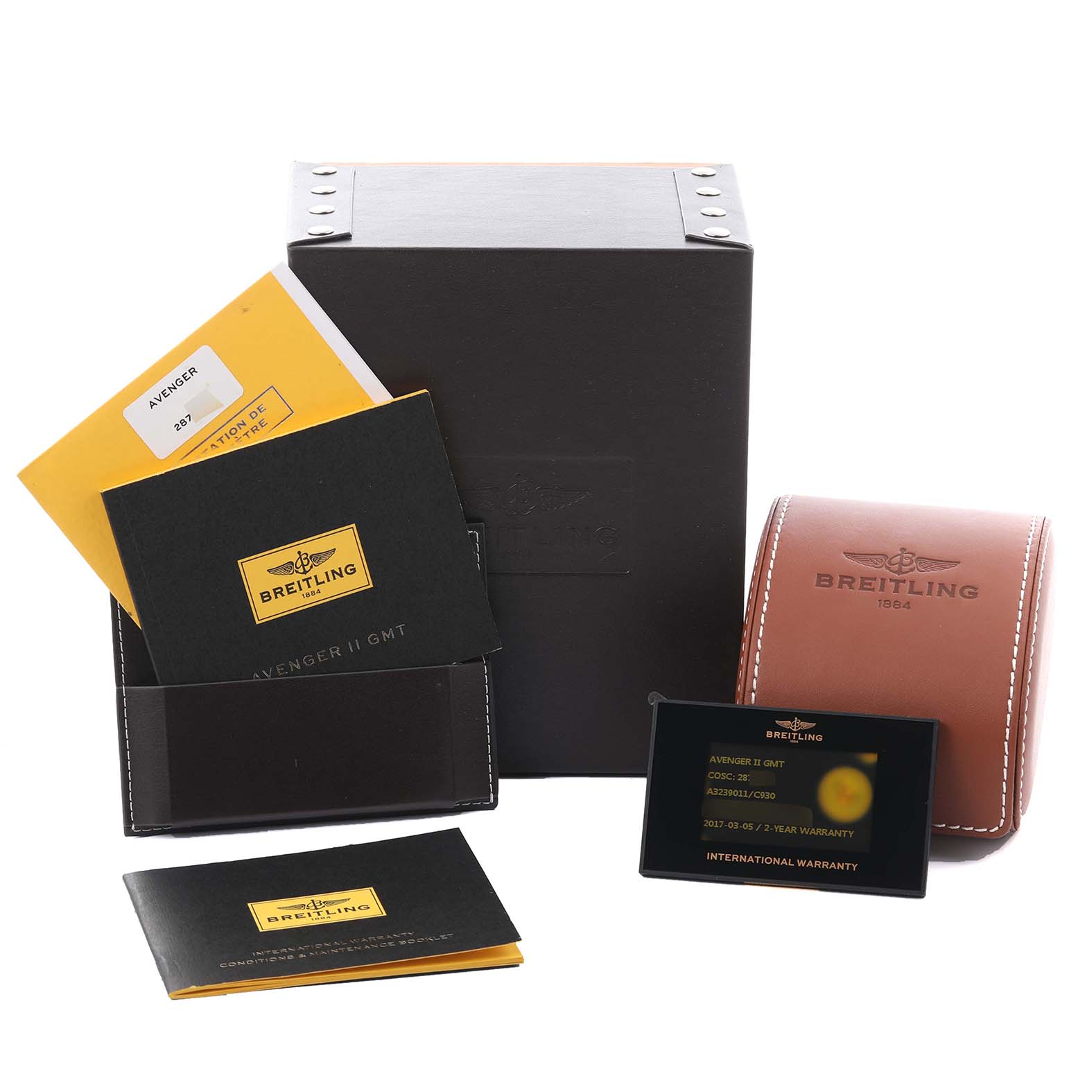 The image shows Breitling Avenger A3239011/C930 Men's Stainless Steel Mother of Pearl Dial A3239011/C930 Men's Stainless Steel Mother of Pearl Dial packaging, manuals, a leather pouch, and an international warranty card.