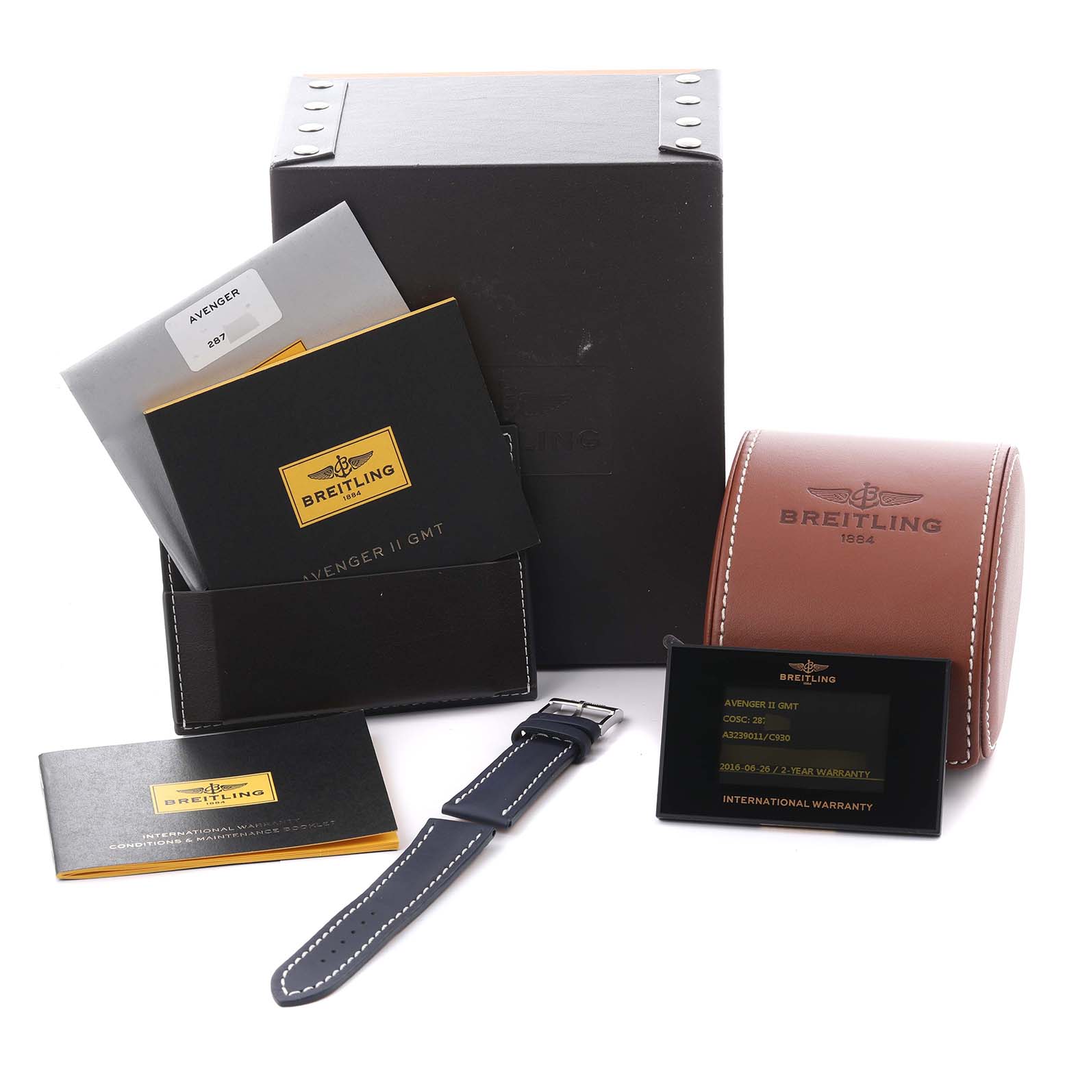 The image shows Breitling Avenger A3239011/C930 Men's Stainless Steel Mother of Pearl Dial A3239011/C930 Men's Stainless Steel Mother of Pearl Dial watch accessories, including a strap, manual, warranty card, and watch box from a front angle.