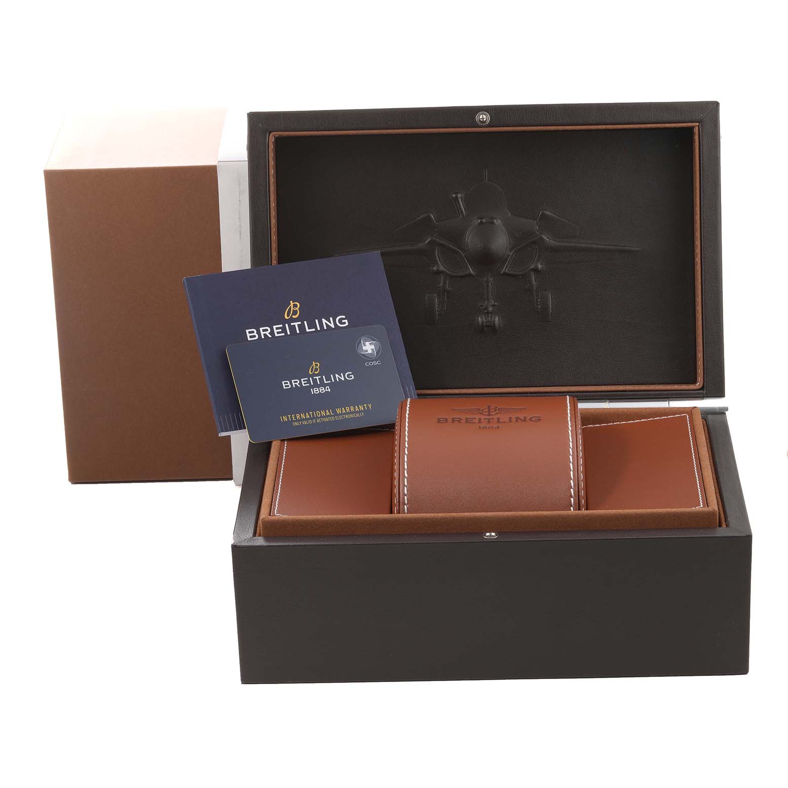 The image shows the packaging and accessories for a Breitling Navitimer, including a box, warranty cards, and a leather watch case.