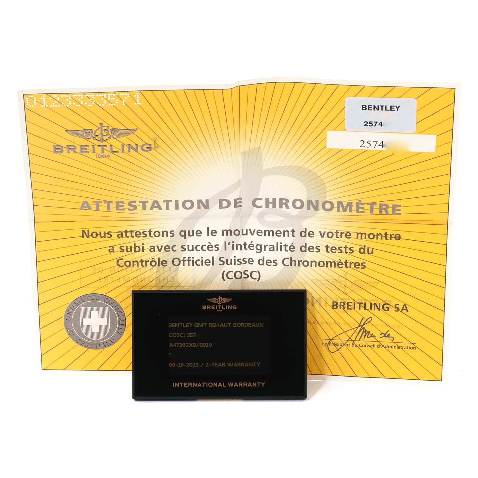 The image shows the warranty card and the certificate for the Bentley model watch by Breitling.