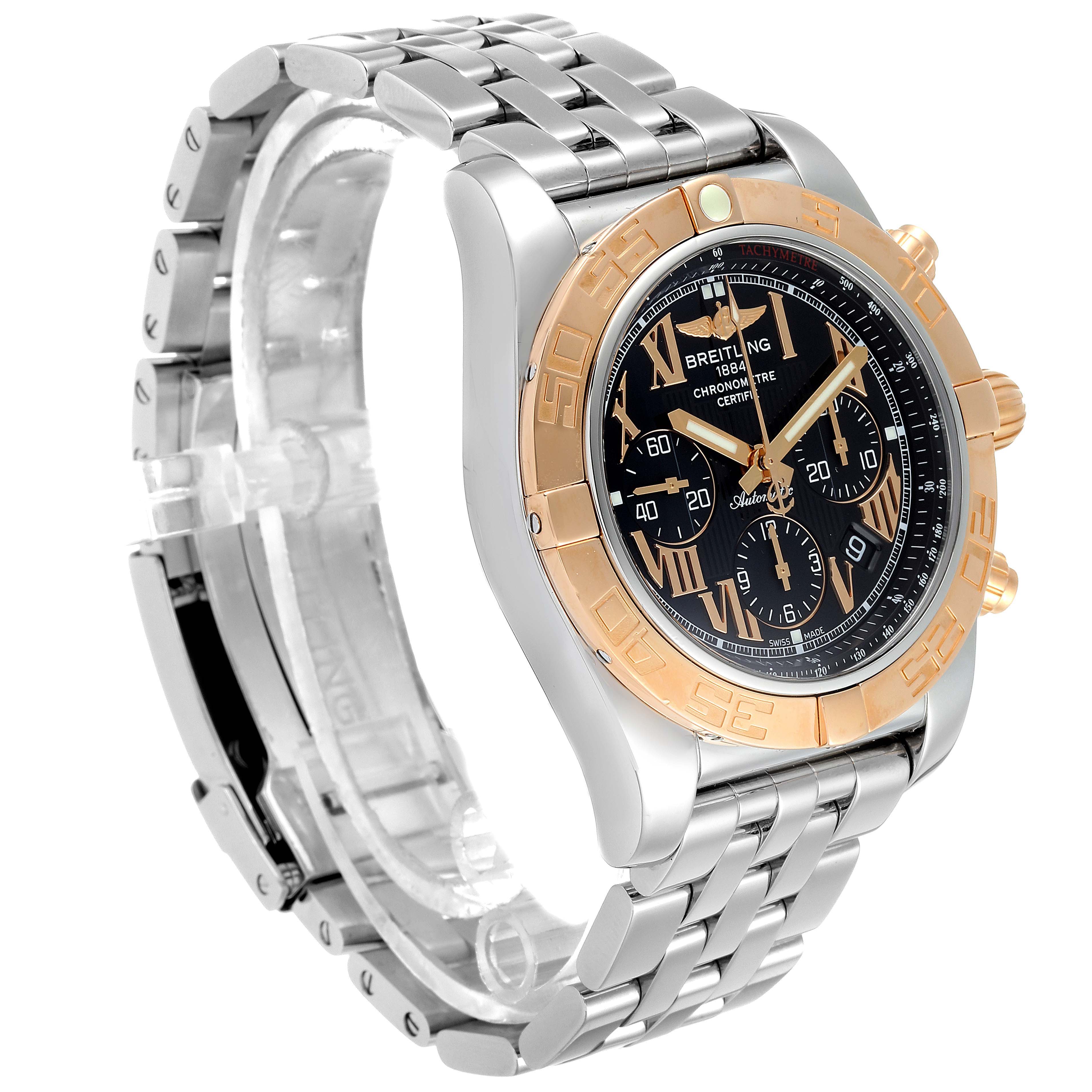 The Breitling Chronomat CB011012 Men's Steel and Gold (two tone) Black Dial CB011012 Men's Steel and Gold (two tone) Black Dial watch is shown from a three-quarter angle, displaying the bezel, bracelet, and chronograph face.