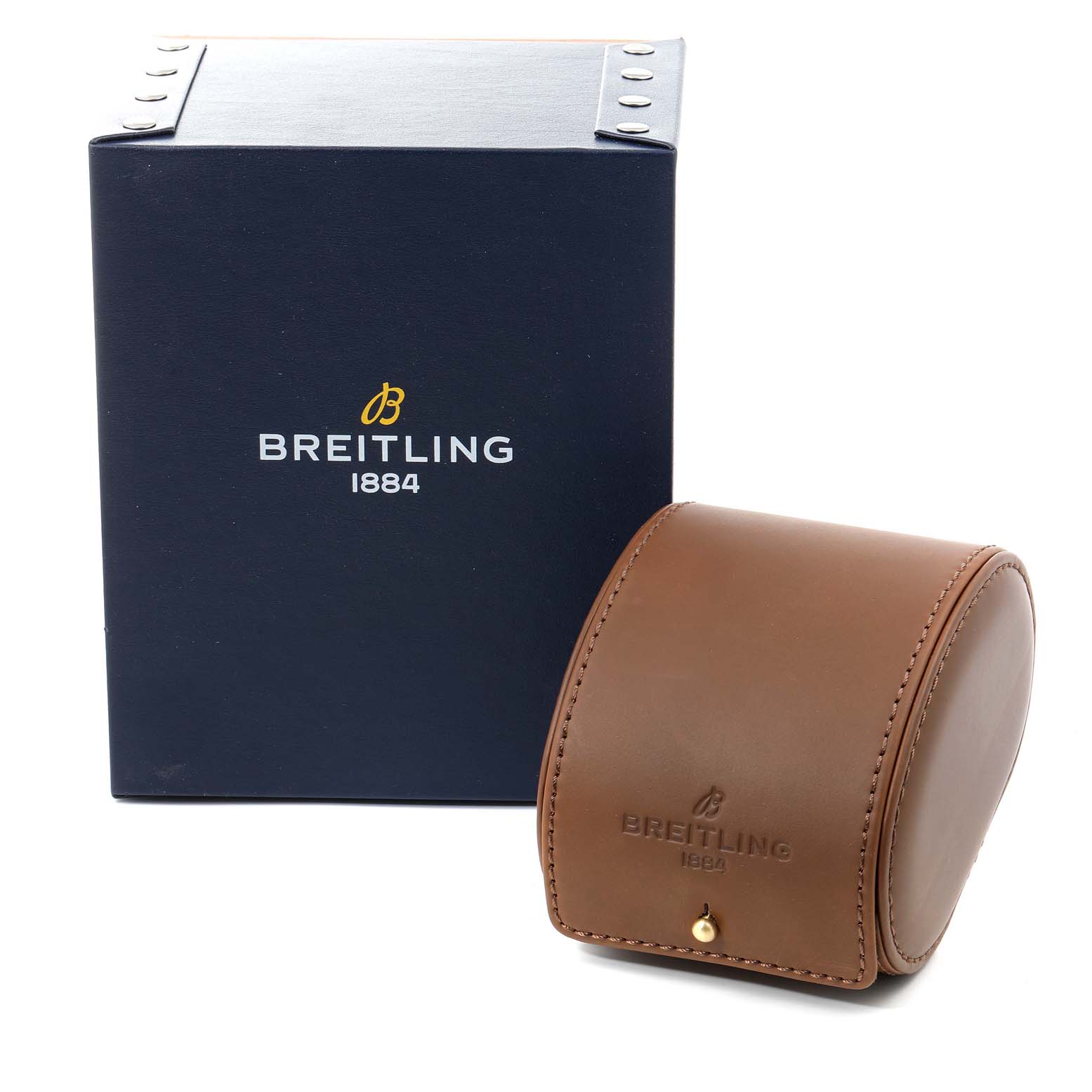 The image shows the packaging of a Breitling Chronomat CB011012 Men's Steel and Gold (two tone) Black Dial CB011012 Men's Steel and Gold (two tone) Black Dial watch, including a navy box and a brown leather case.