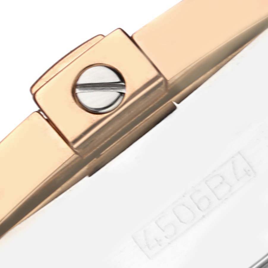 This close-up image shows the clasp and part of the bracelet of a Breitling Chronomat C13356 Men's Steel and Gold (two tone) Black Dial C13356 Men's Steel and Gold (two tone) Black Dial watch.