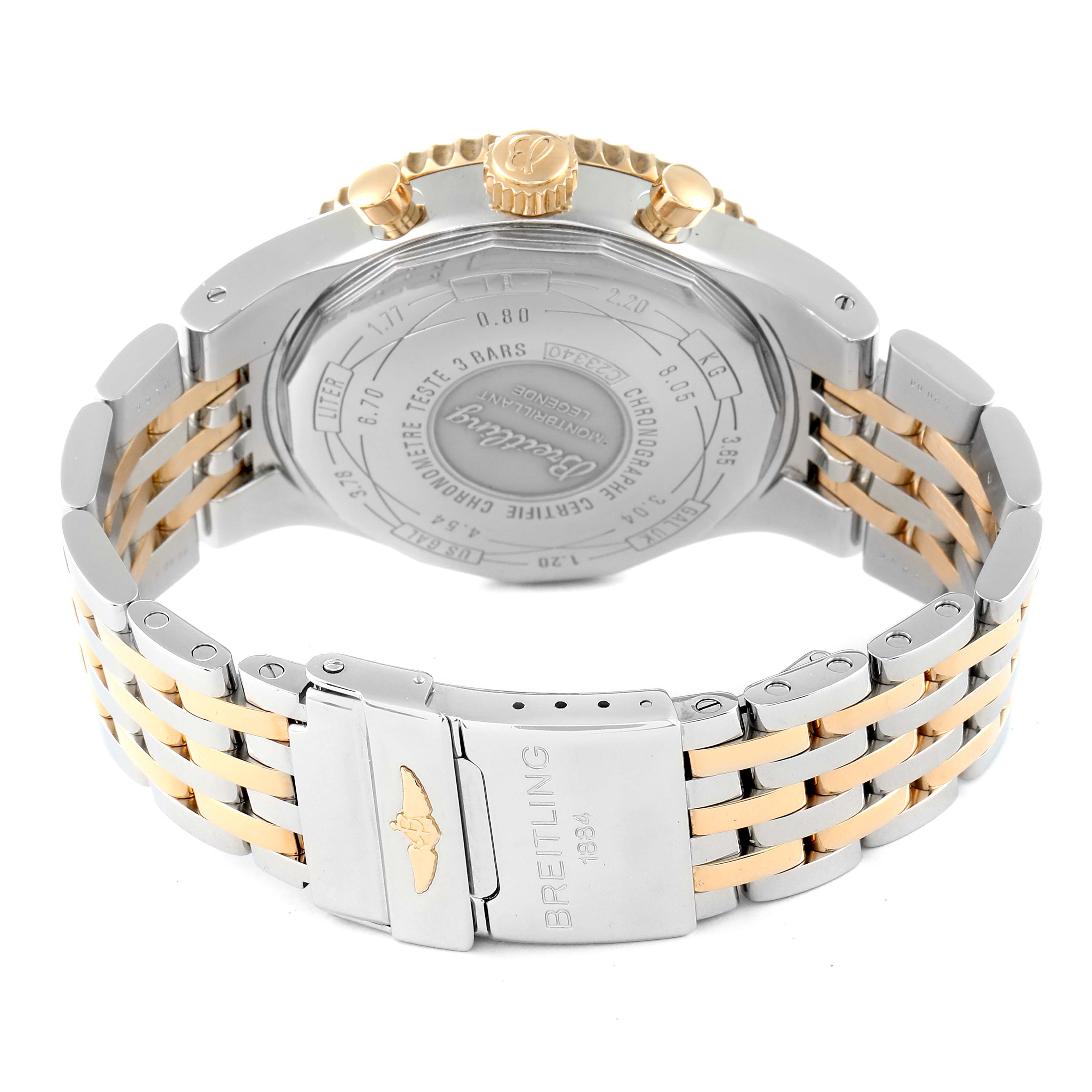 The image shows the back and clasp of a Breitling Navitimer C23340 Men's Steel and Gold (two tone) Brown Dial C23340 Men's Steel and Gold (two tone) Brown Dial watch, highlighting the case back and bi-tone bracelet.