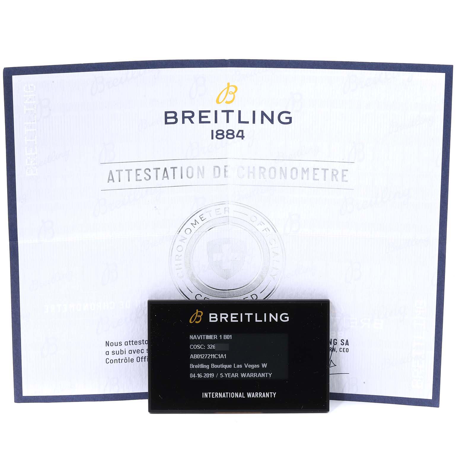 This image shows the warranty booklet and card for a Breitling Navitimer AB0127211C1A1 Men
s Stainless Steel Blue Dial AB0127211C1A1 Men
s Stainless Steel Blue Dial model watch.