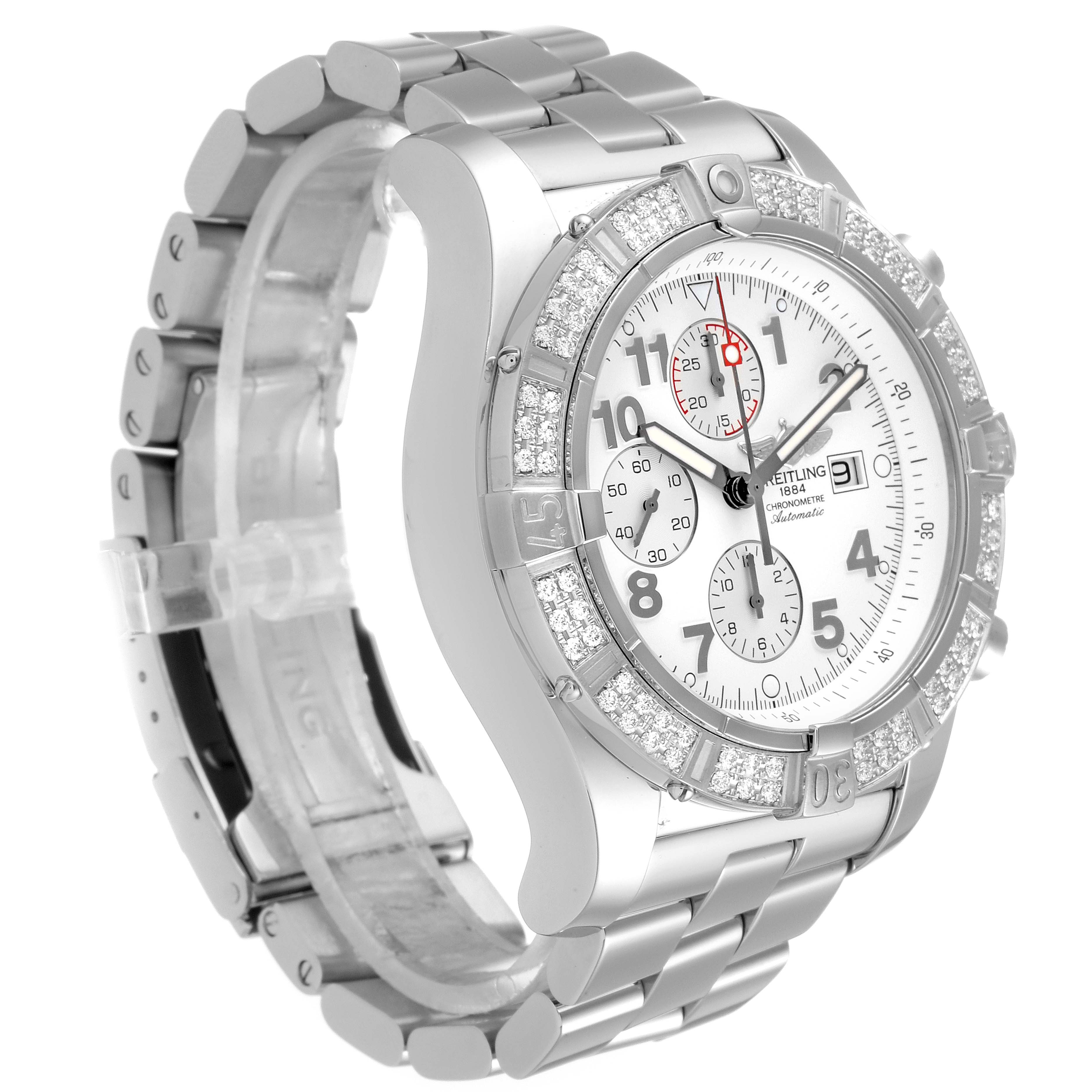 This image shows a side angle of a Breitling Avenger A13370 Men's Stainless Steel White Dial A13370 Men's Stainless Steel White Dial watch featuring a silver bracelet and a diamond-encrusted bezel.