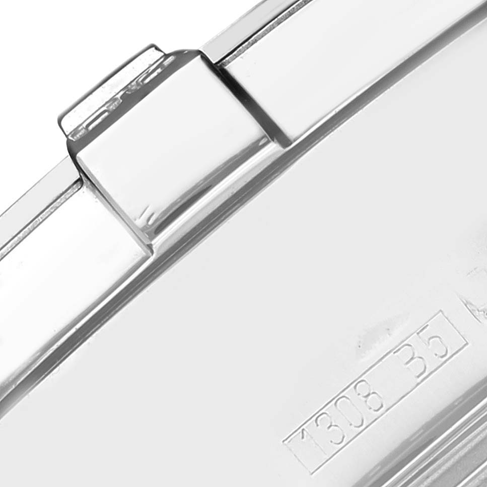 This image shows a close-up view of the clasp and part of the bracelet of a Breitling Superocean A13340 Men's Stainless Steel Black Dial A13340 Men's Stainless Steel Black Dial watch, highlighting its metallic finish and engraved number.