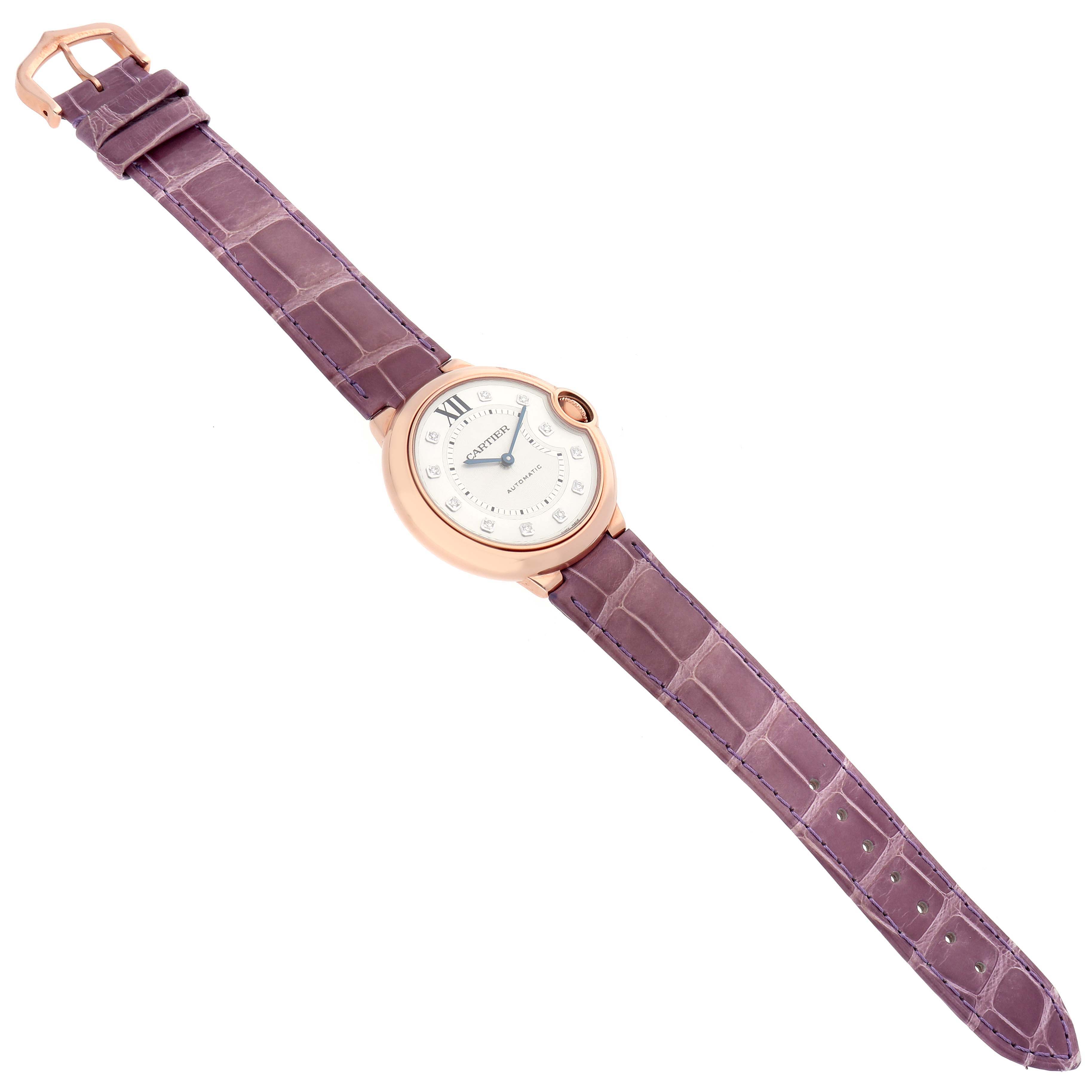 The Cartier Ballon Bleu WJBB0010 Women's Rose Gold Silver Dial WJBB0010 Women's Rose Gold Silver Dial watch is shown from an angled top view, displaying the full face and strap.