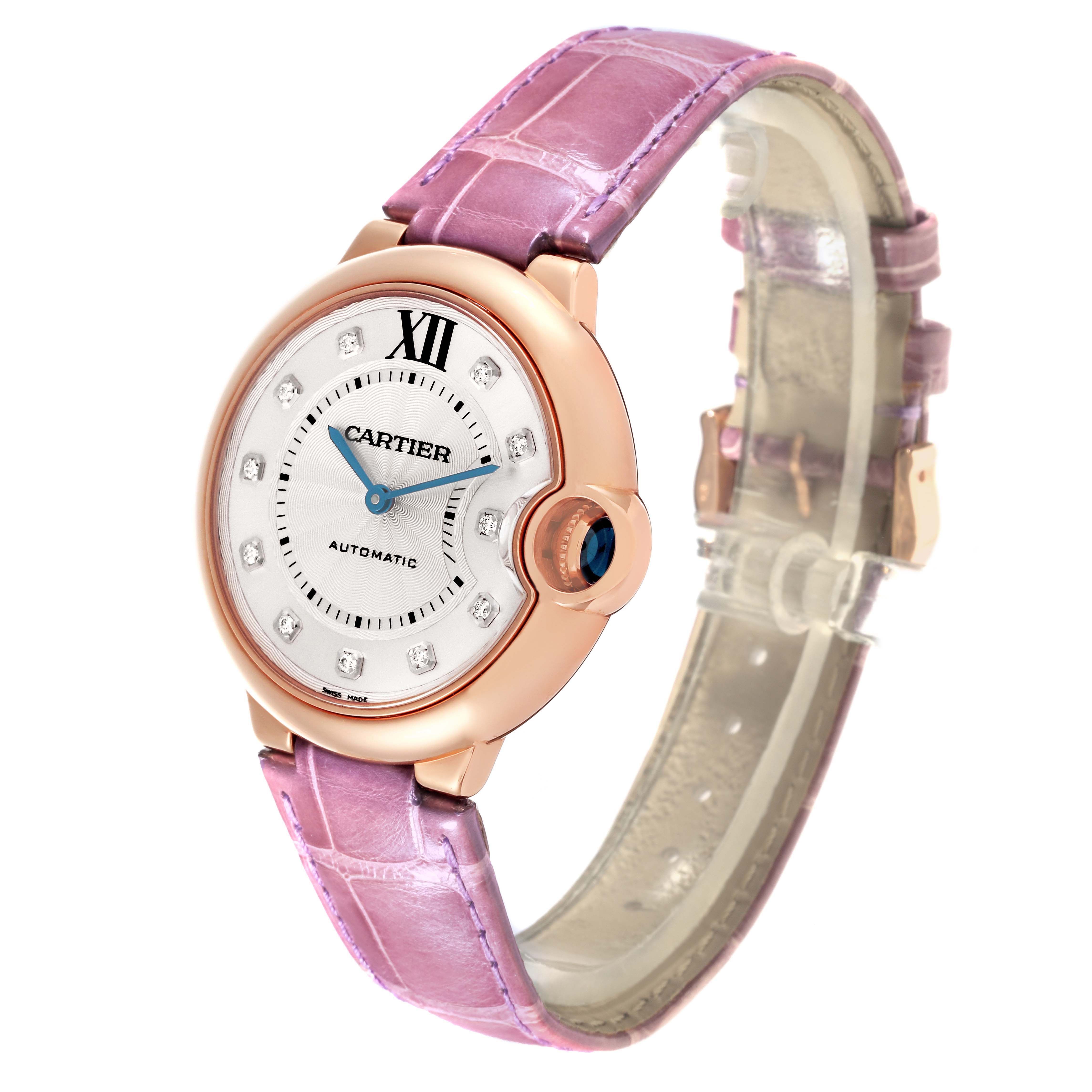 The image shows a Cartier Ballon Bleu WJBB0010 Women's Rose Gold Silver Dial WJBB0010 Women's Rose Gold Silver Dial watch at a three-quarter angle, displaying the face, side profile, and lavender strap.