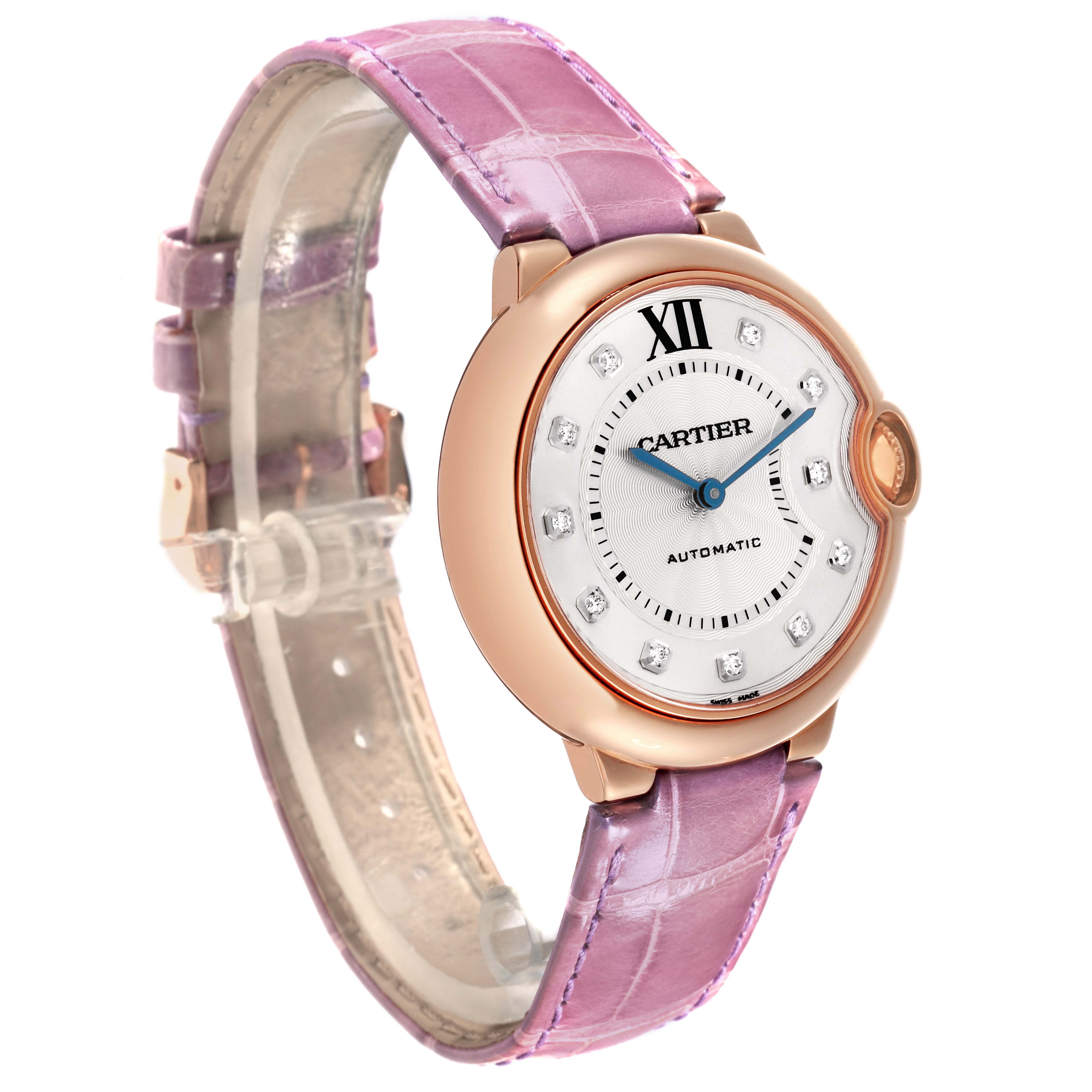 The Cartier Ballon Bleu WJBB0010 Women's Rose Gold Silver Dial WJBB0010 Women's Rose Gold Silver Dial watch is shown at a three-quarter angle, highlighting its face, pink strap, and signature crown.