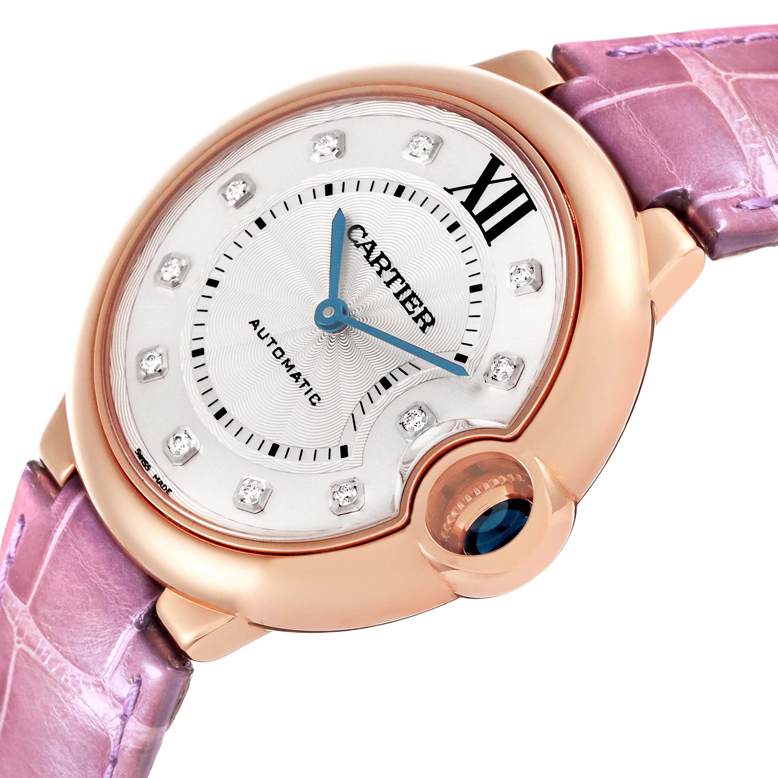 The Cartier Ballon Bleu WJBB0010 Women's Rose Gold Silver Dial WJBB0010 Women's Rose Gold Silver Dial watch is shown at a slight side angle, highlighting the dial, crown, and pink strap.
