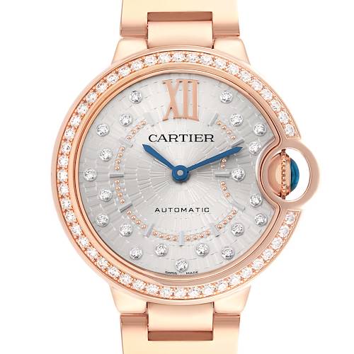 The Cartier Ballon Bleu watch is shown from a front angle, highlighting its face, bezel with diamonds, and part of the bracelet.