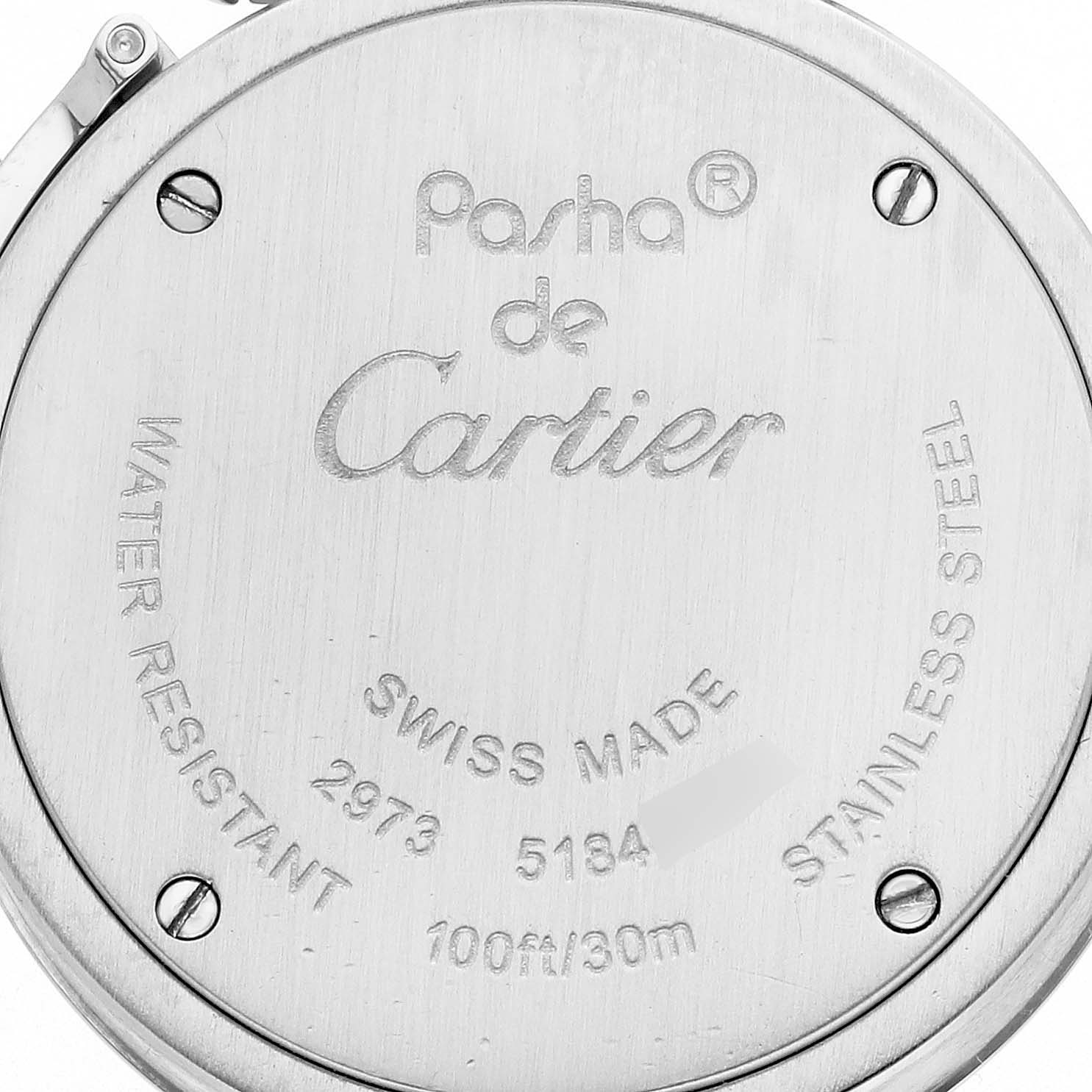 The image shows the back case of the Cartier Pasha W3140008 Women's Stainless Steel Pink Dial W3140008 Women's Stainless Steel Pink Dial watch, highlighting brand engravings and water resistance details.