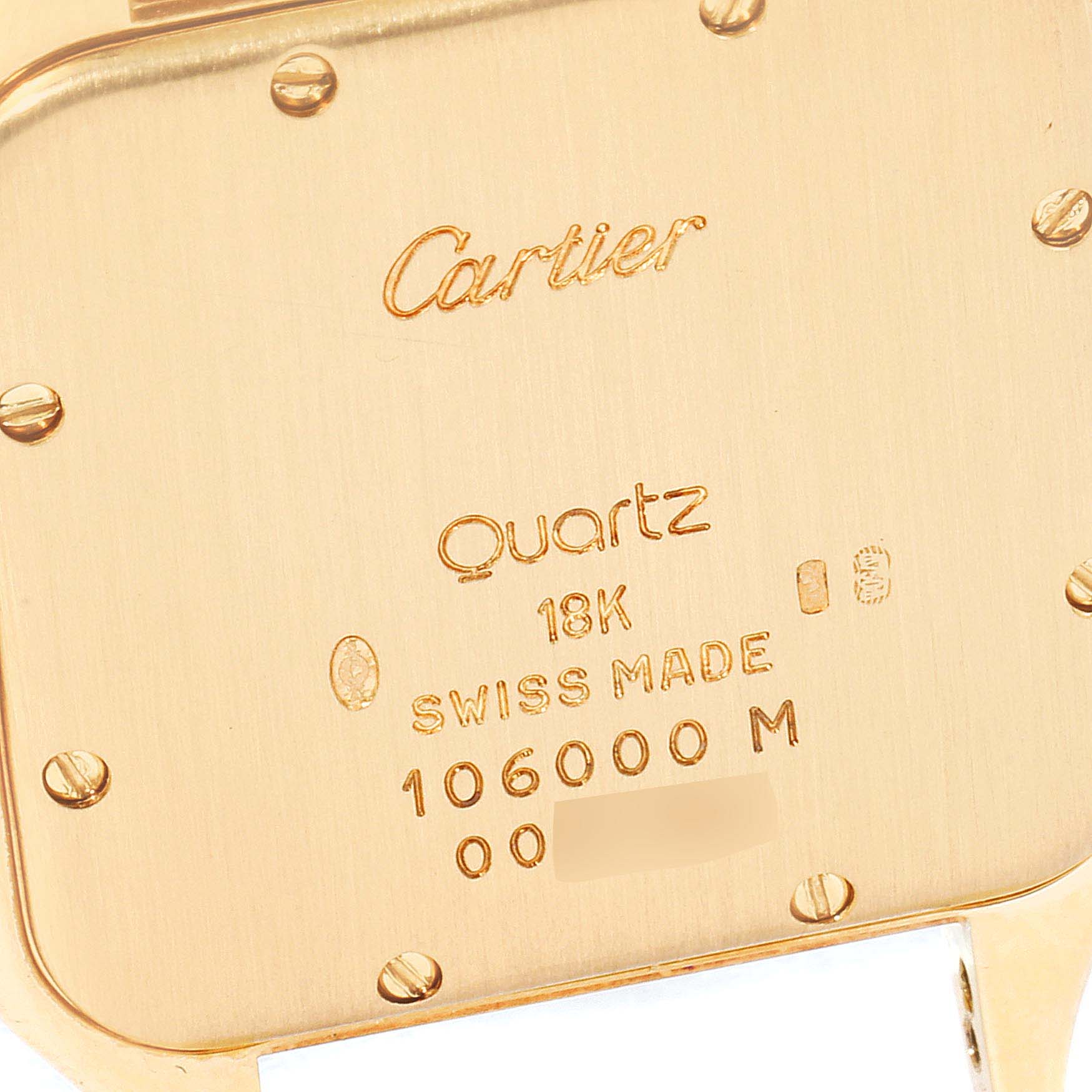 This image shows the back case of a Cartier Panthere W25014B9 Men's Yellow Gold Silver Dial W25014B9 Men's Yellow Gold Silver Dial quartz watch, displaying the brand name, model details, and material specifications.