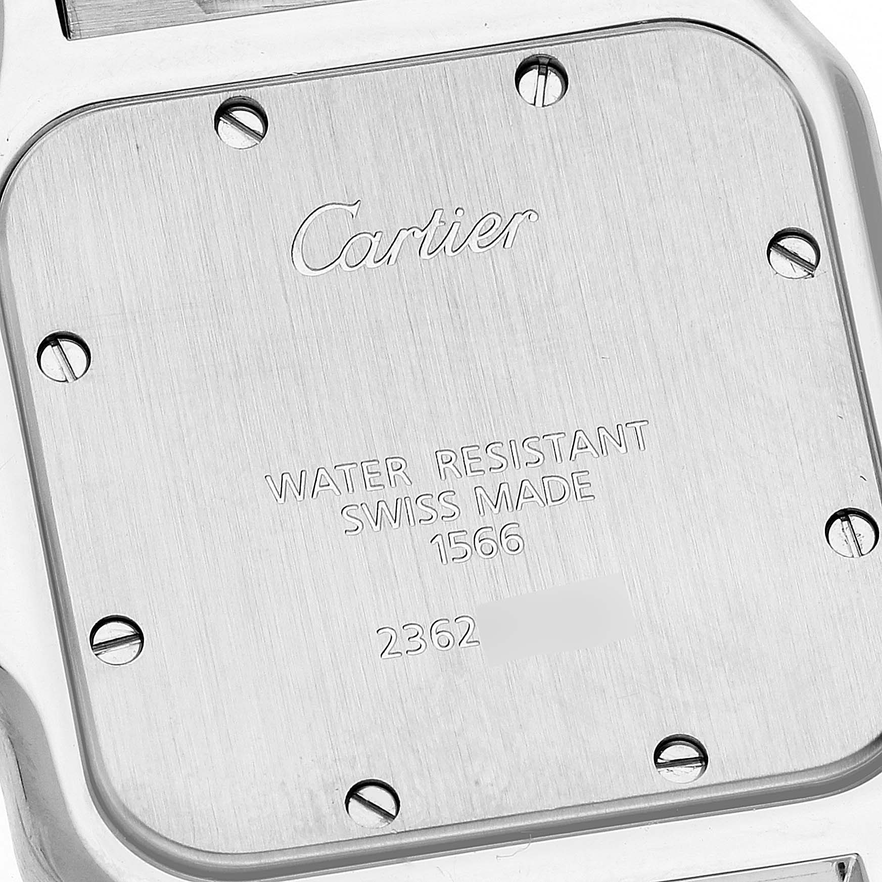 The image shows the back case of a Santos model by Cartier, engraved with specifications.