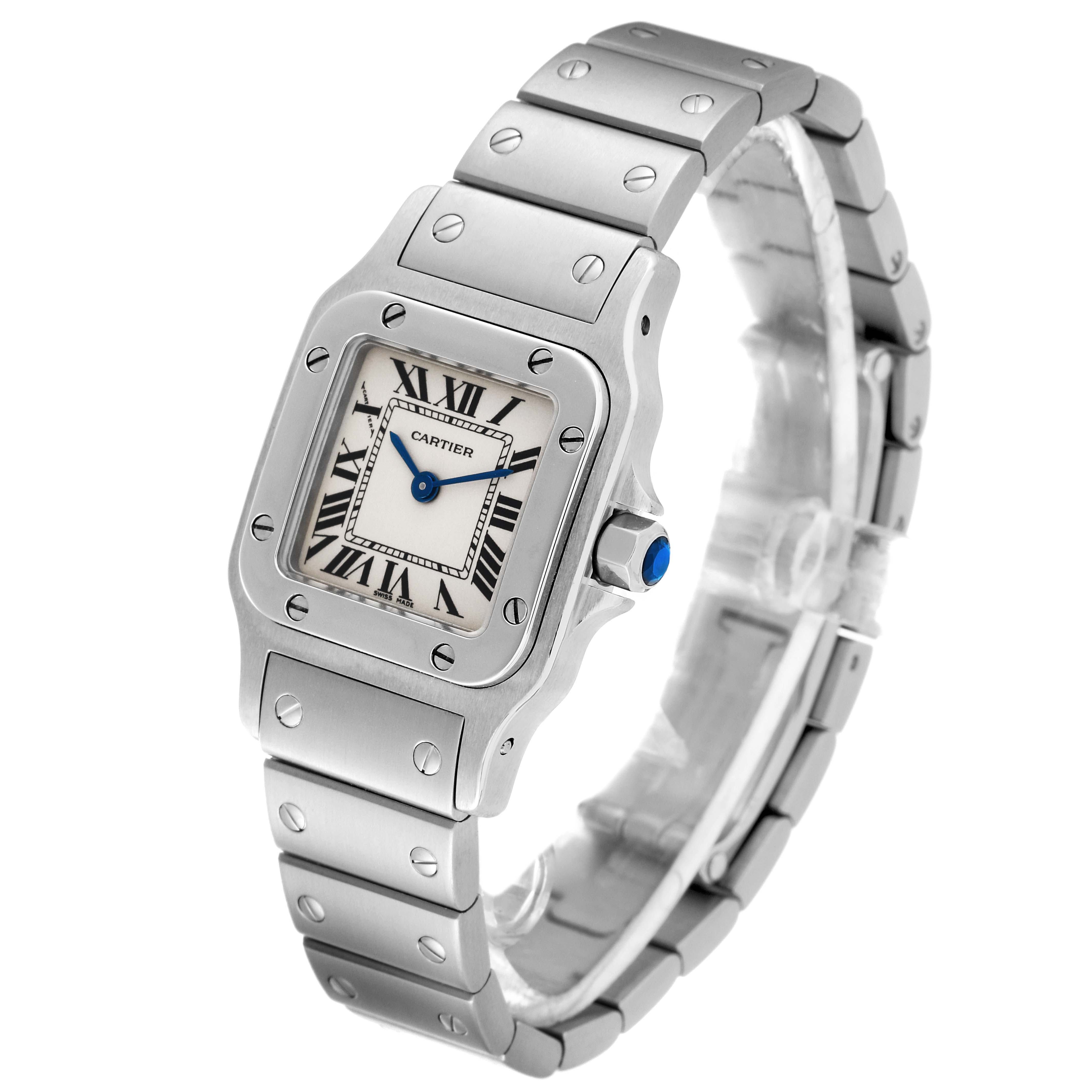 The image shows a Cartier Santos W20056D6 Women's Stainless Steel Silver Dial W20056D6 Women's Stainless Steel Silver Dial watch at a tilted angle, highlighting the face, bezel, crown, and bracelet.