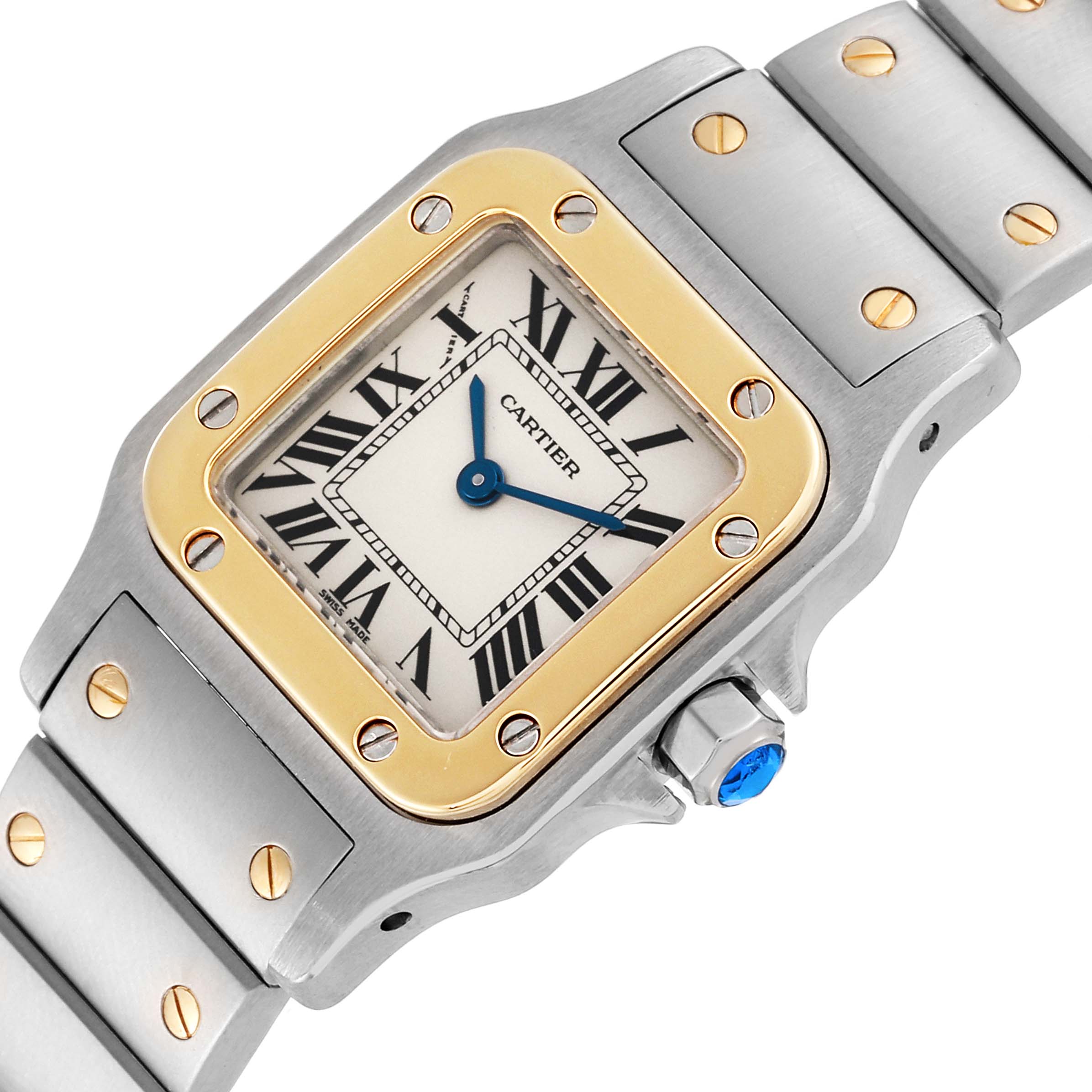 The Cartier Santos W20012C4 Women's Steel and Gold (two tone) Silver Dial W20012C4 Women's Steel and Gold (two tone) Silver Dial model watch is shown at a slight angle, highlighting its square face, bezel, crown, and bracelet.