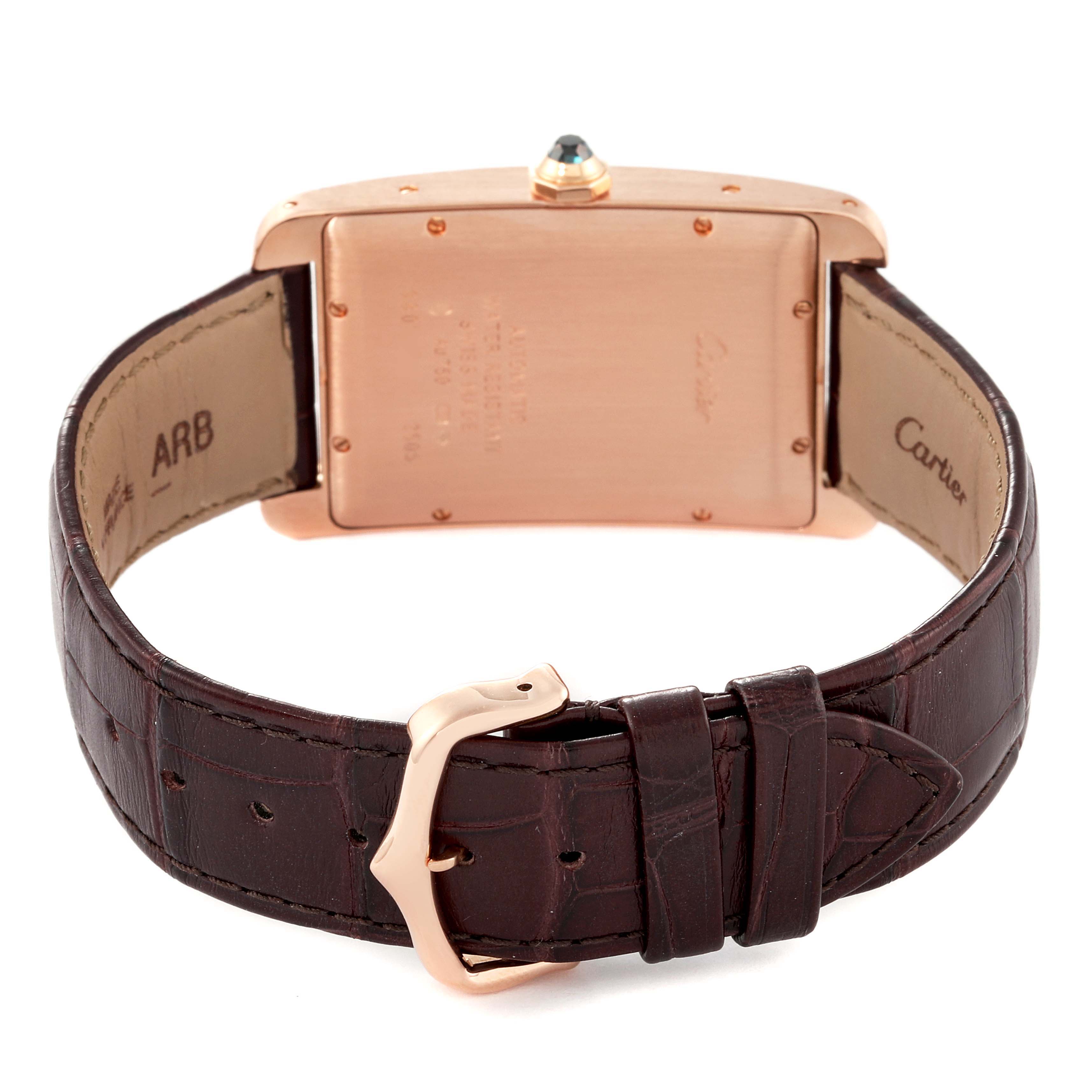 This image shows the back view of the Cartier Tank Americaine W2609156 Men's Rose Gold Silver Dial W2609156 Men's Rose Gold Silver Dial watch, highlighting the case and brown leather strap with buckle.