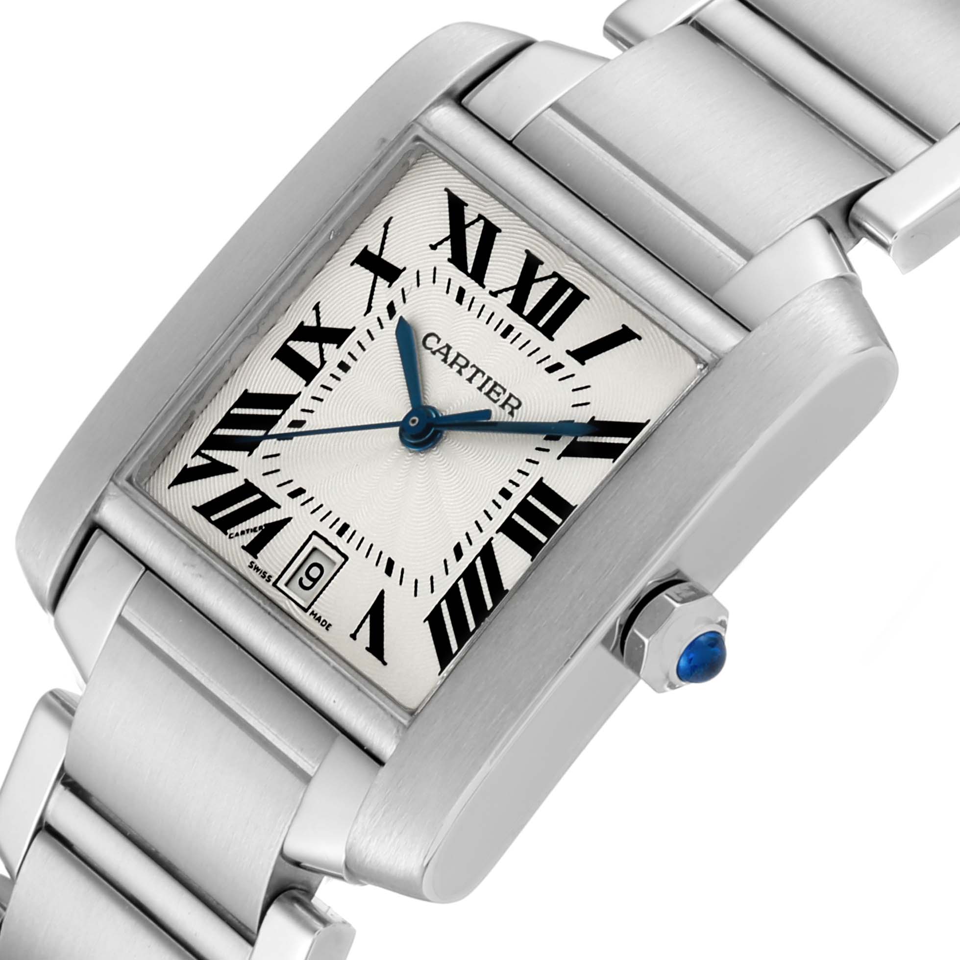 The image shows the Cartier Tank Française watch at an angled close-up, highlighting the face, Roman numerals, hands, date display, and part of the bracelet.