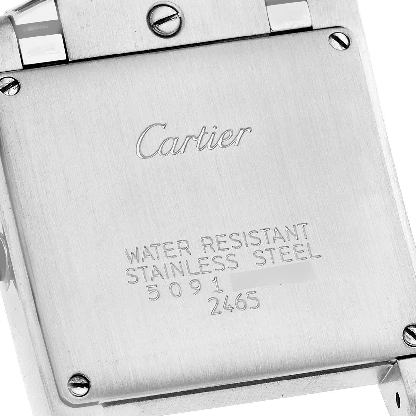 This image shows the back case of a Cartier Tank Francaise W51012Q4 Women's Steel and Gold (two tone) Silver Dial W51012Q4 Women's Steel and Gold (two tone) Silver Dial watch, highlighting the brand engraving and stainless steel material.