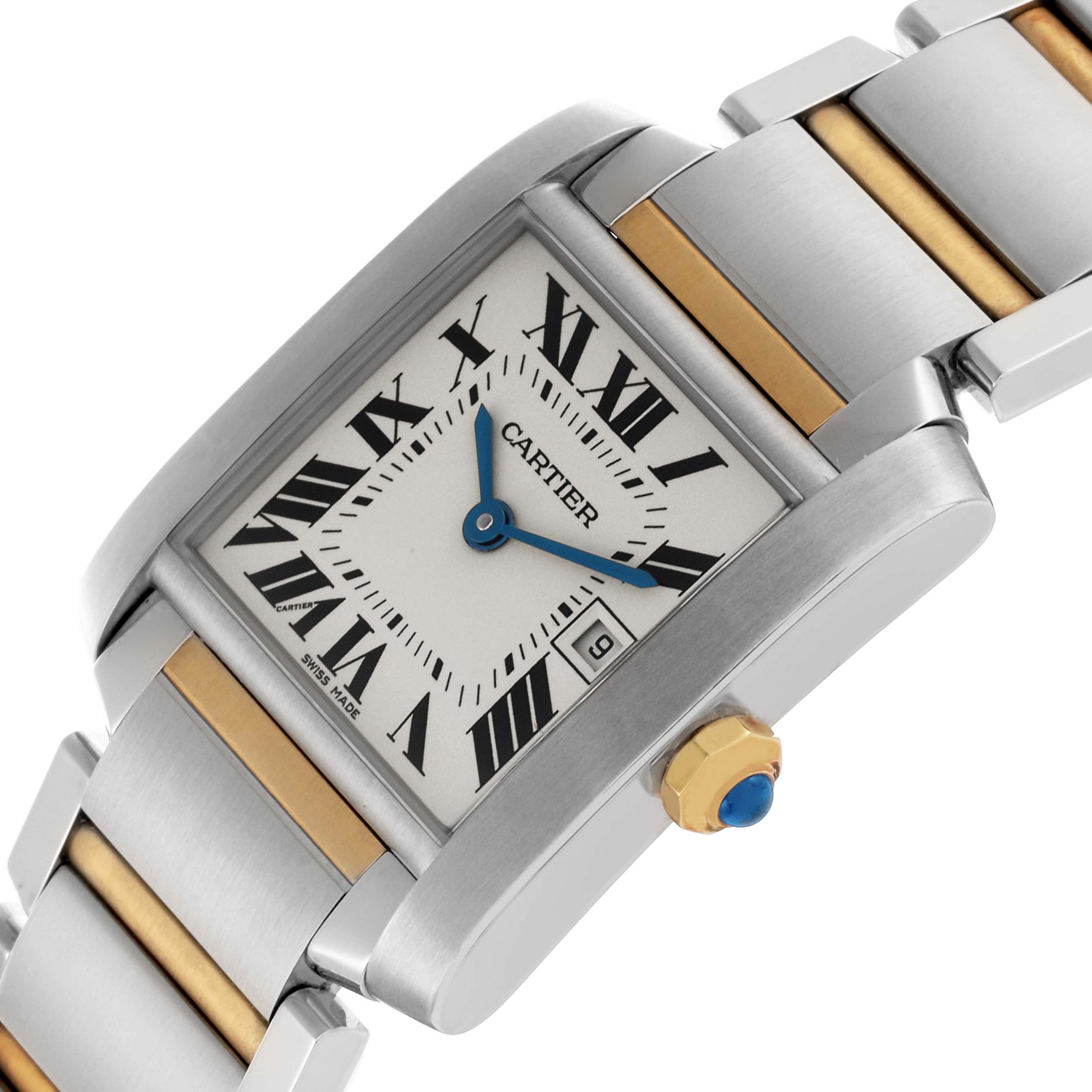 The Cartier Tank Française watch is shown at an angled close-up, highlighting the face, blue hands, crown, and two-tone bracelet.