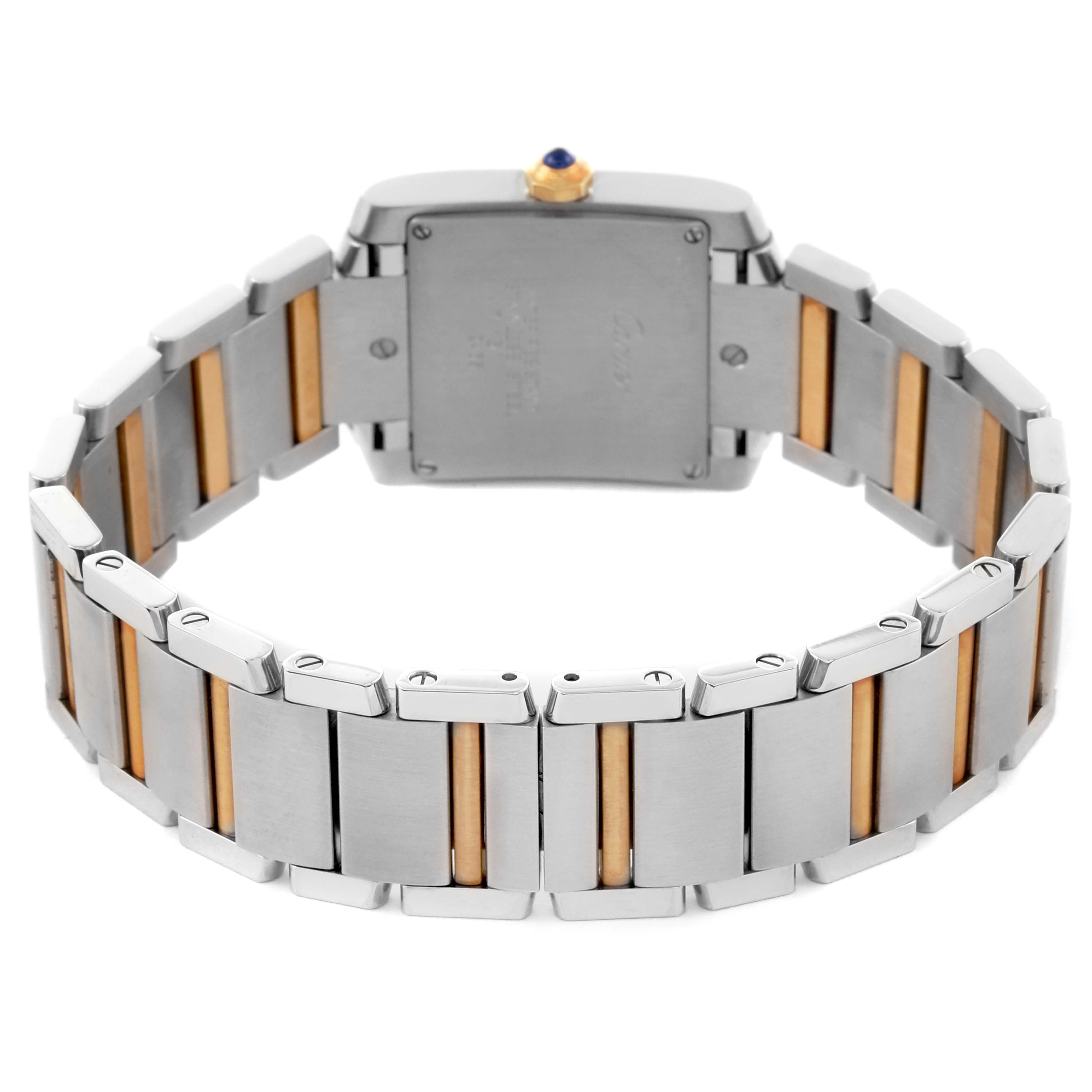 The image shows the back and bracelet of the Cartier Tank Française watch, featuring a two-tone metal design.