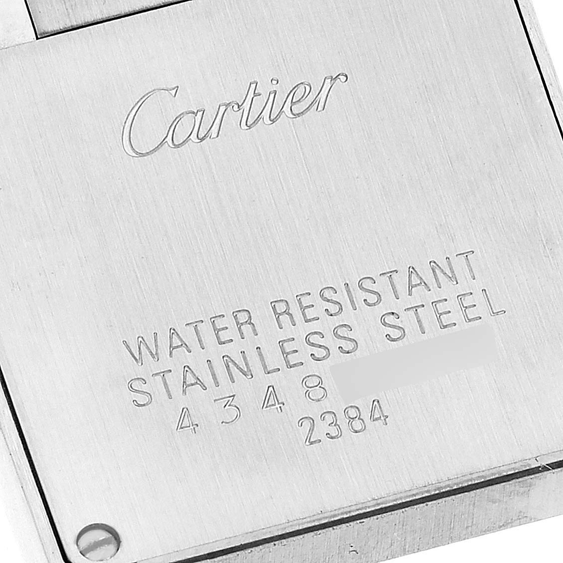 The image shows the back case of a Cartier Tank Francaise W51027Q4 Women's Steel and Gold (two tone) Mother of Pearl Dial W51027Q4 Women's Steel and Gold (two tone) Mother of Pearl Dial watch, highlighting the brand engraving and water resistance information.