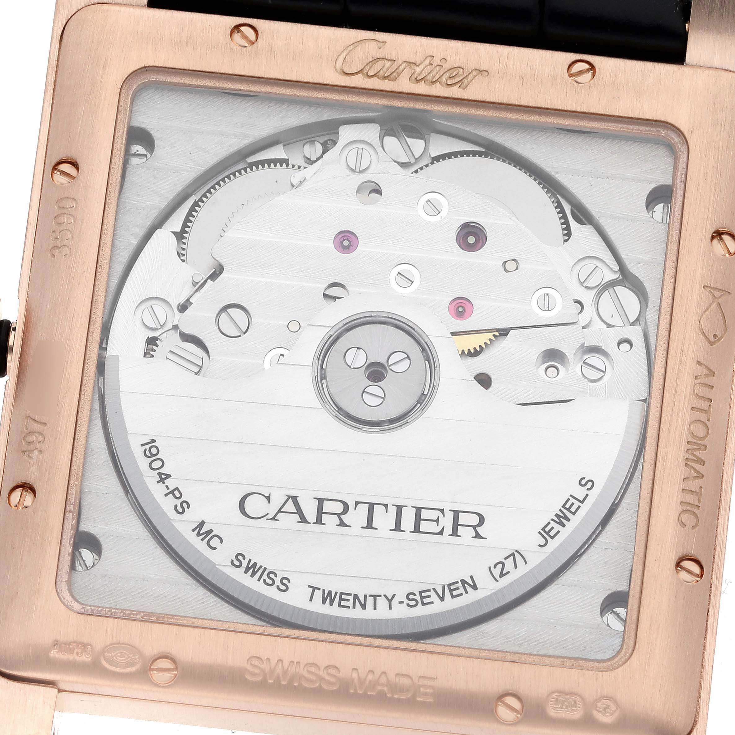 The image shows the back of a Cartier Tank MC WGTA0014 Mens Rose Gold Grey Dial watch, highlighting its automatic movement and engravings through a transparent case.