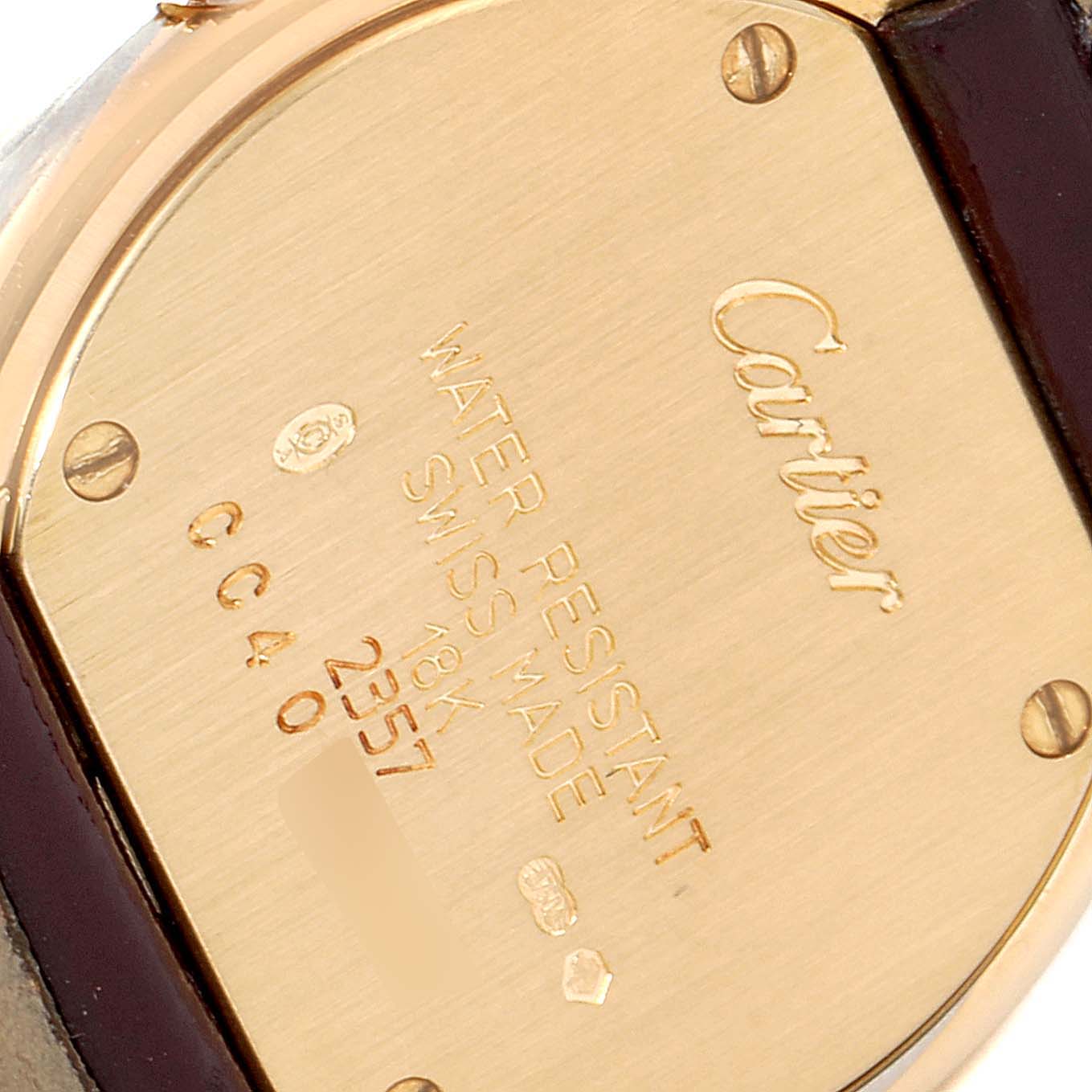 The image shows the back case of a Trinity model Cartier watch, highlighting brand engraving and water resistance.