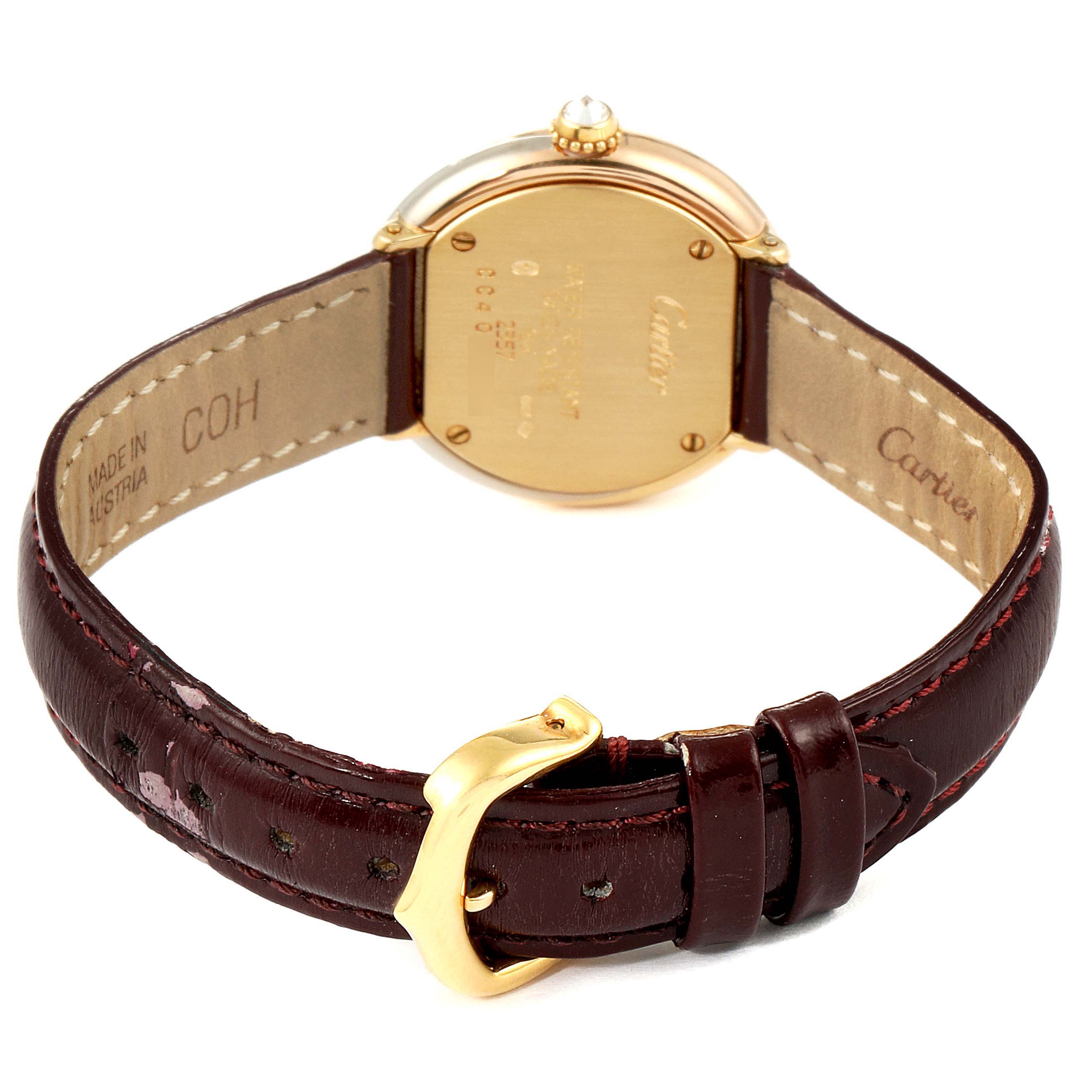 This image shows the back and strap of a Cartier Trinity W200246 Women's Yellow Gold Beige Dial W200246 Women's Yellow Gold Beige Dial model watch, highlighting the gold case back and leather strap.