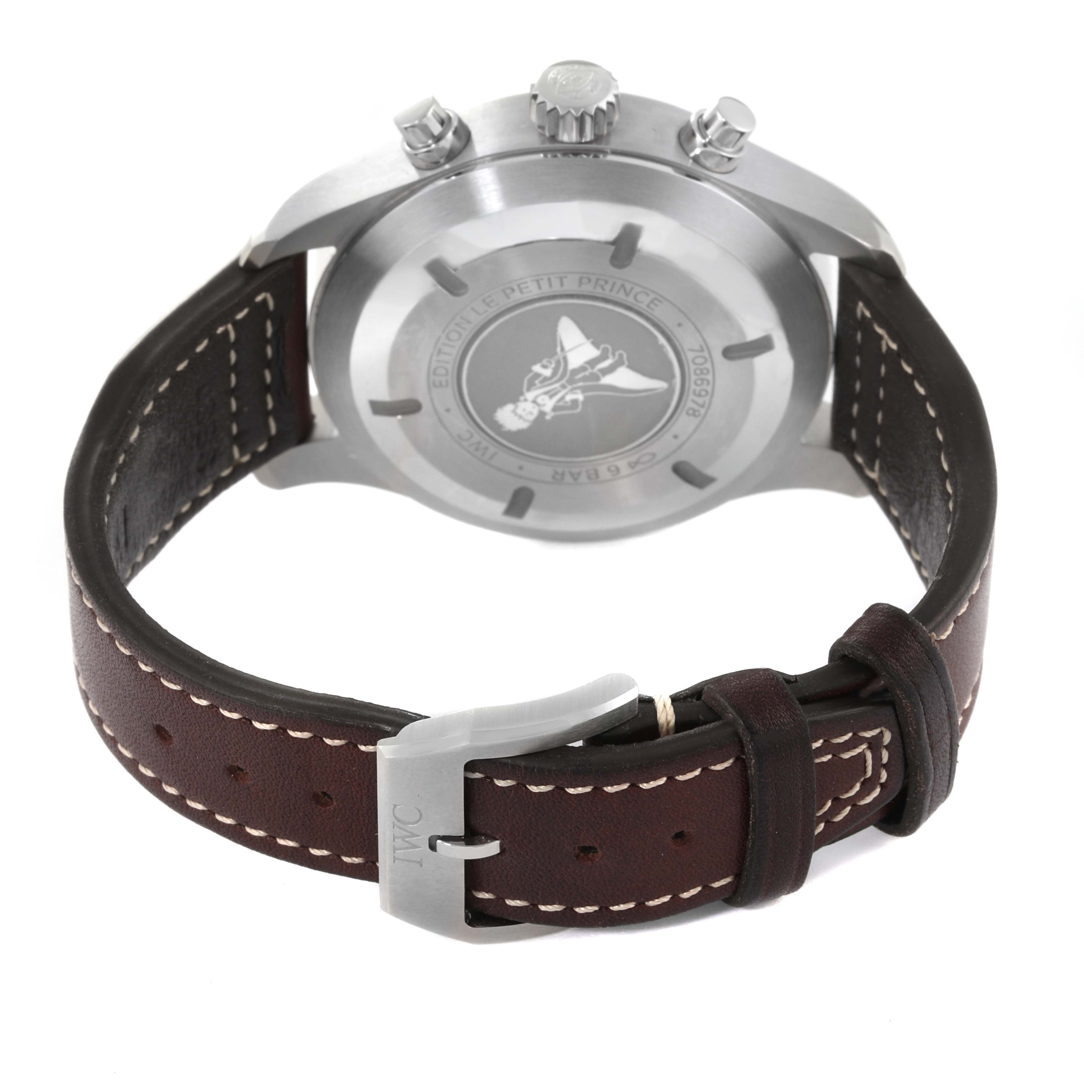 The image shows the back case, crown, and brown leather strap with buckle of an IWC Pilot IW377714 Men's Stainless Steel Blue Dial IW377714 Men's Stainless Steel Blue Dial watch model.