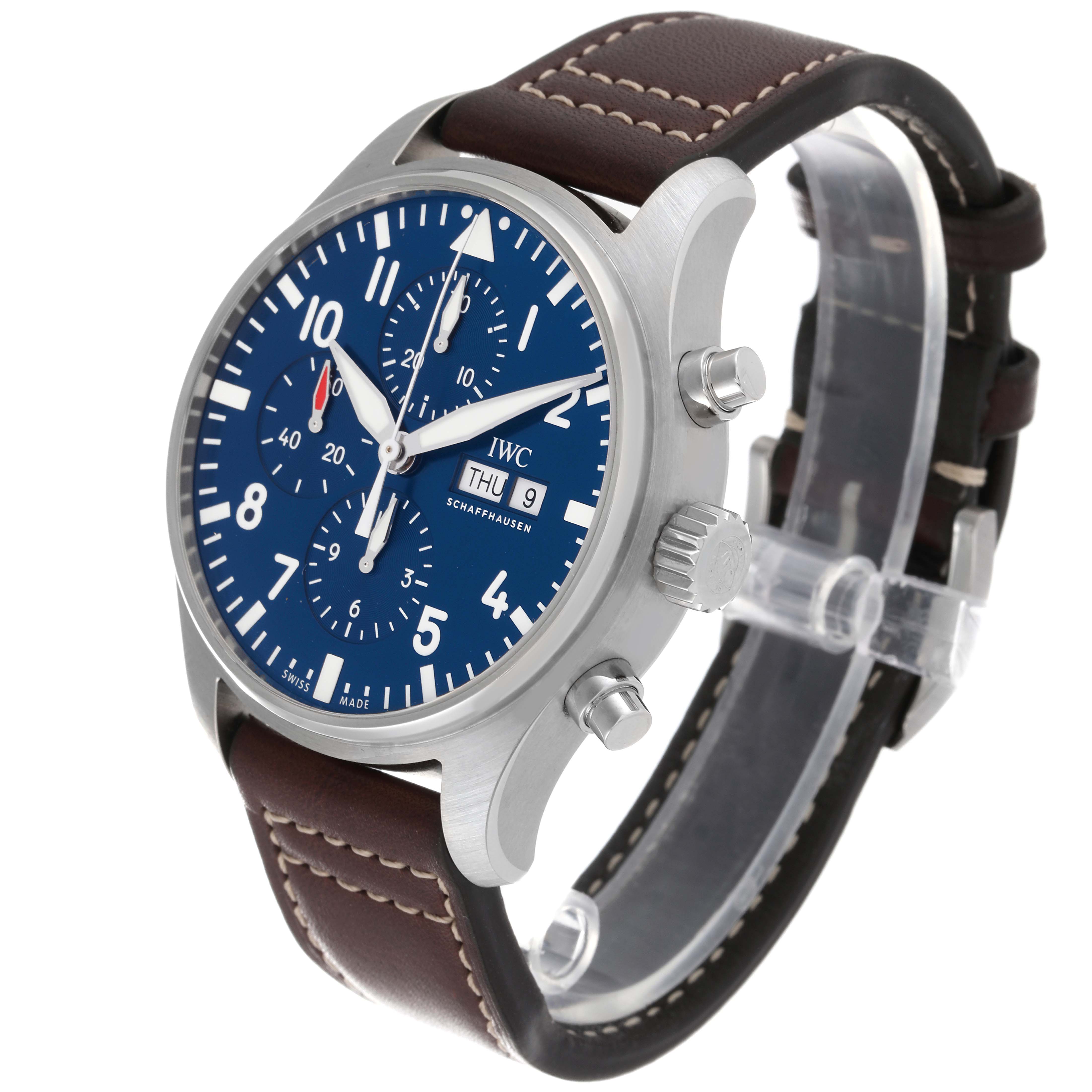 This IWC Pilot IW377714 Men's Stainless Steel Blue Dial IW377714 Men's Stainless Steel Blue Dial model watch is shown from an angle displaying the dial, side buttons, crown, and part of the leather strap.