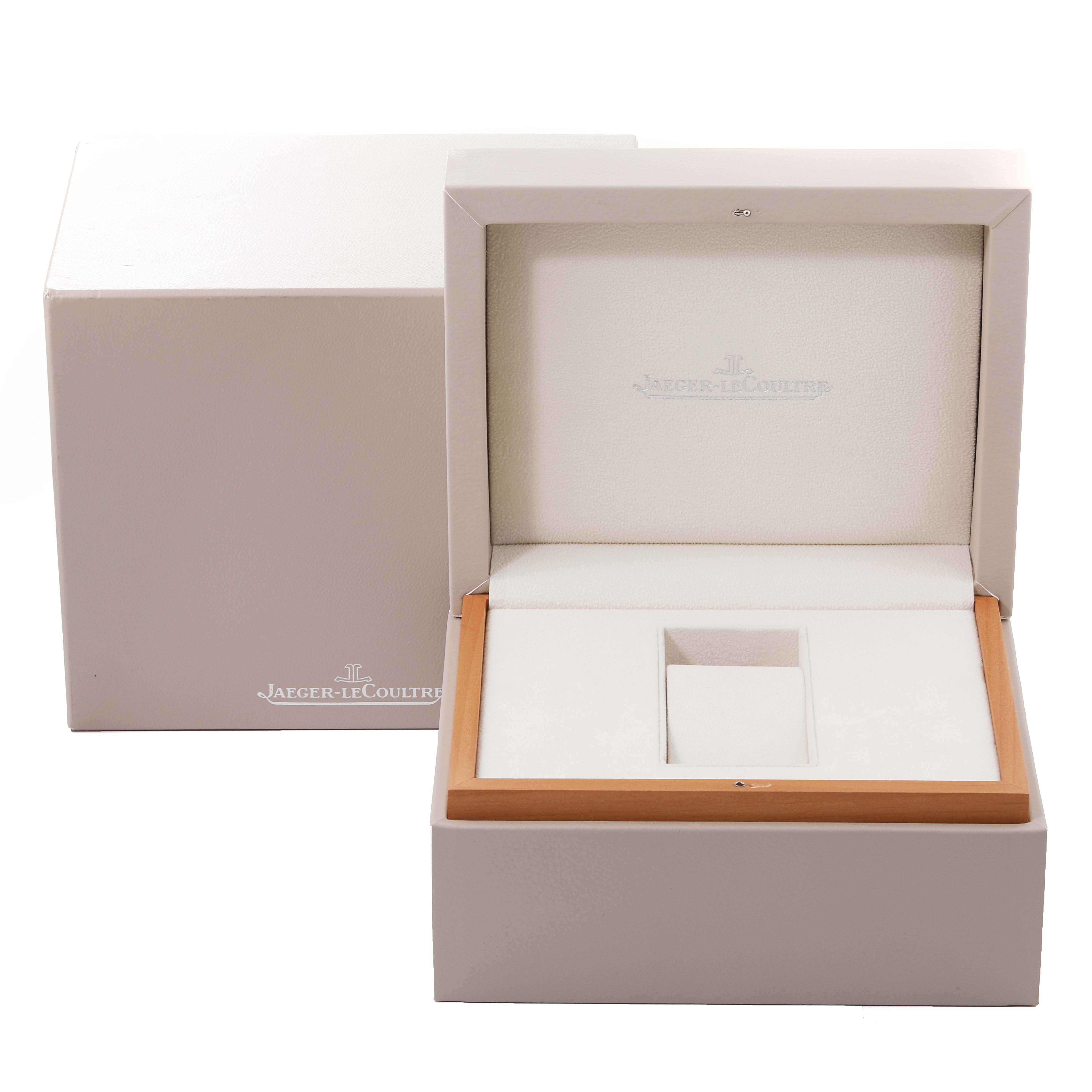The image shows an open Jaeger-LeCoultre Reverso watch box and the outer box.