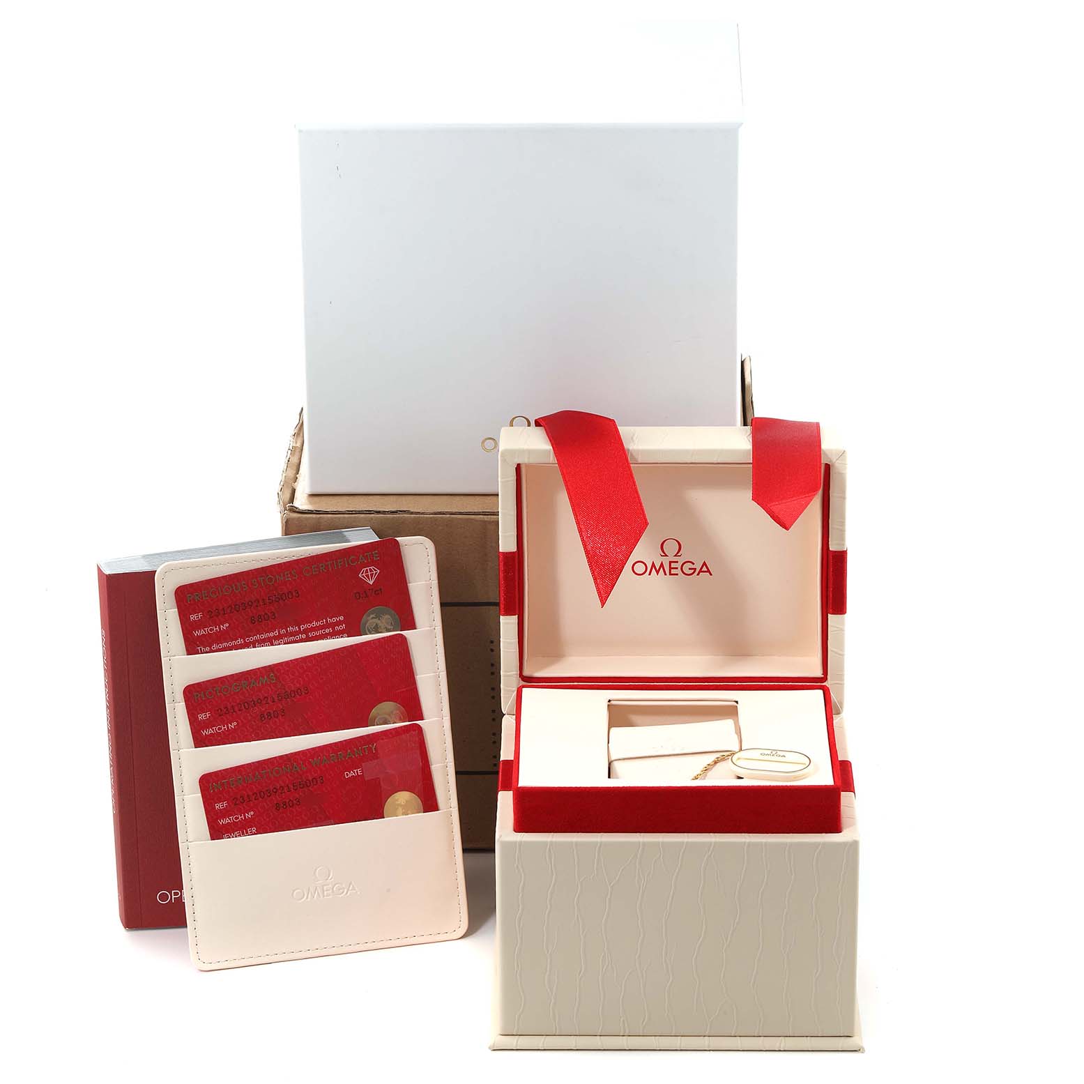 This image shows the packaging and accessories for the Omega 231.20.39.21.55.003 Women's Steel and Gold (two tone) Mother of Pearl Dial 231.20.39.21.55.003 Women's Steel and Gold (two tone) Mother of Pearl Dial Aqua Terra Rose Gold Mother of Pearl Diamond Ladies Watch 231.20.39.21.55.003.