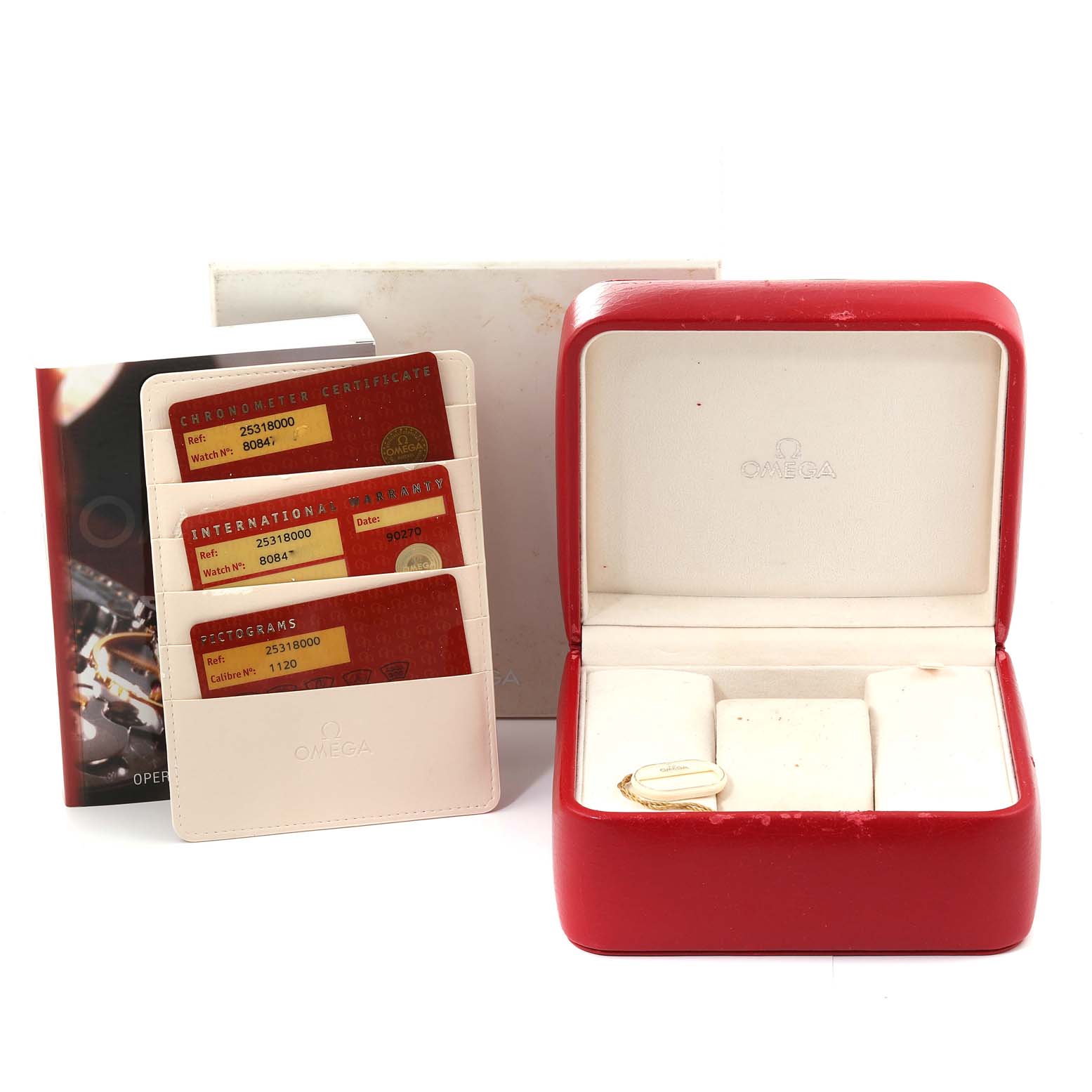 The image shows an Omega Seamaster 2531.80.00 Men
s Stainless Steel Blue Dial 2531.80.00 Men
s Stainless Steel Blue Dial watch box, a red cardholder with certificates, and an operating manual, taken from a front angle.