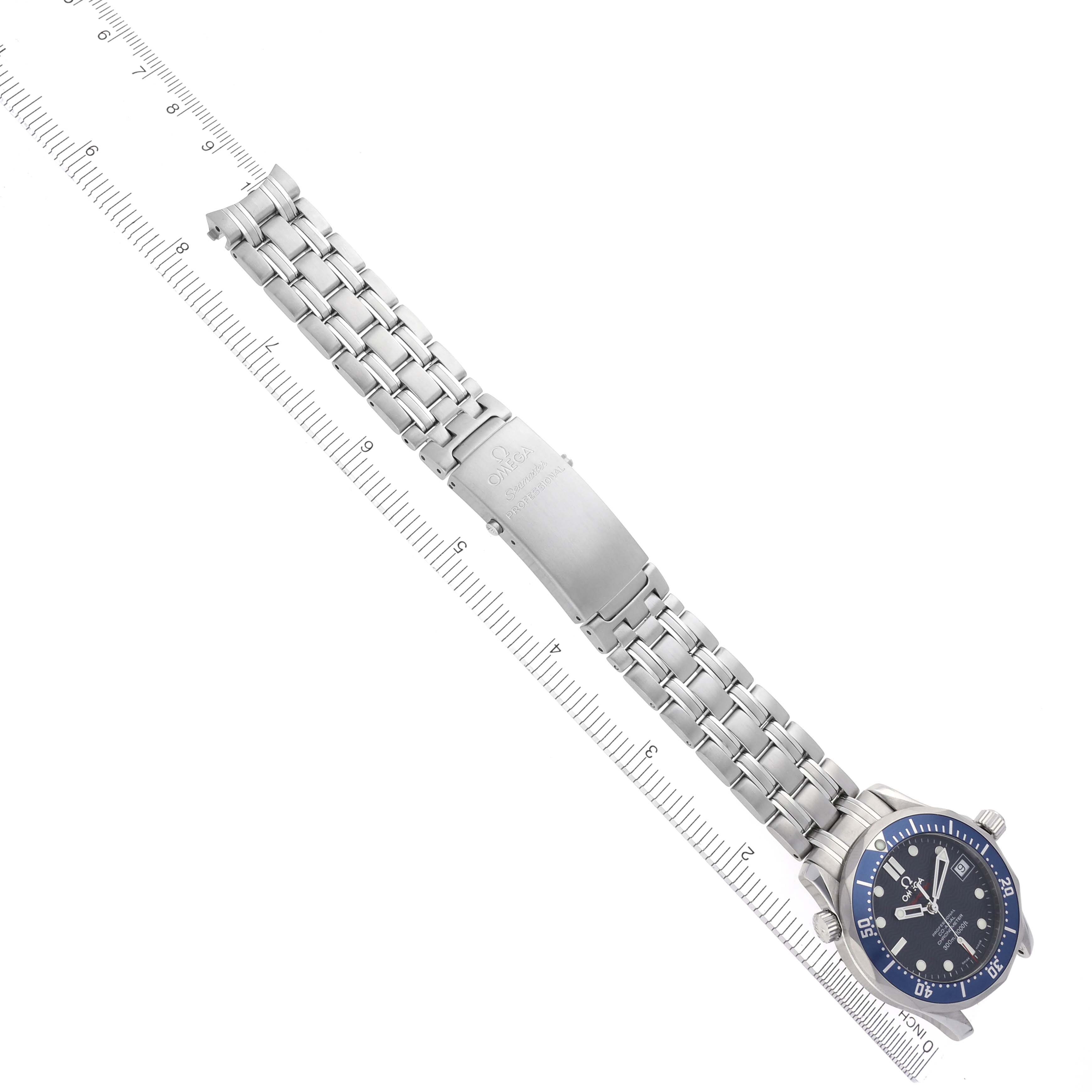 The Omega Seamaster 2222.80.00 Men
s Stainless Steel Blue Dial 2222.80.00 Men
s Stainless Steel Blue Dial watch is shown at a slight angle, displaying the face and full bracelet, positioned alongside a ruler.