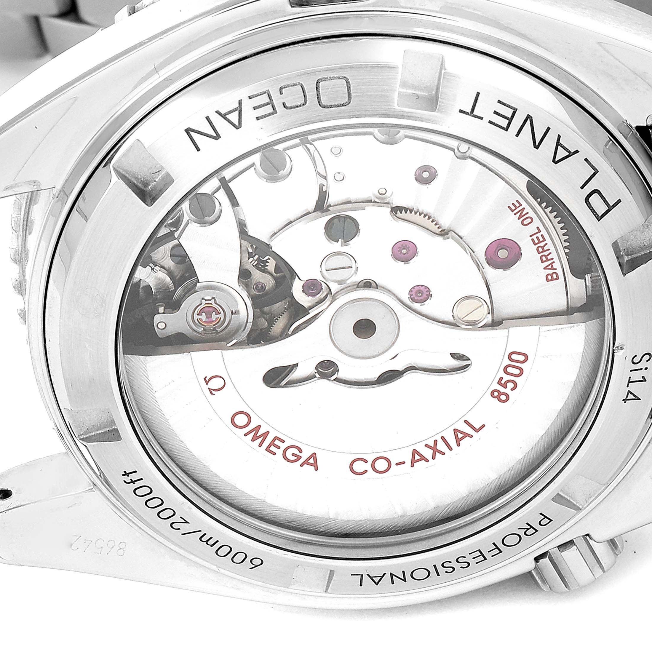 The image shows the back view of the Omega Planet Ocean 232.30.42.21.01.003 Men's Stainless Steel Black Dial 232.30.42.21.01.003 Men's Stainless Steel Black Dial watch, highlighting its Co-Axial 8500 movement.