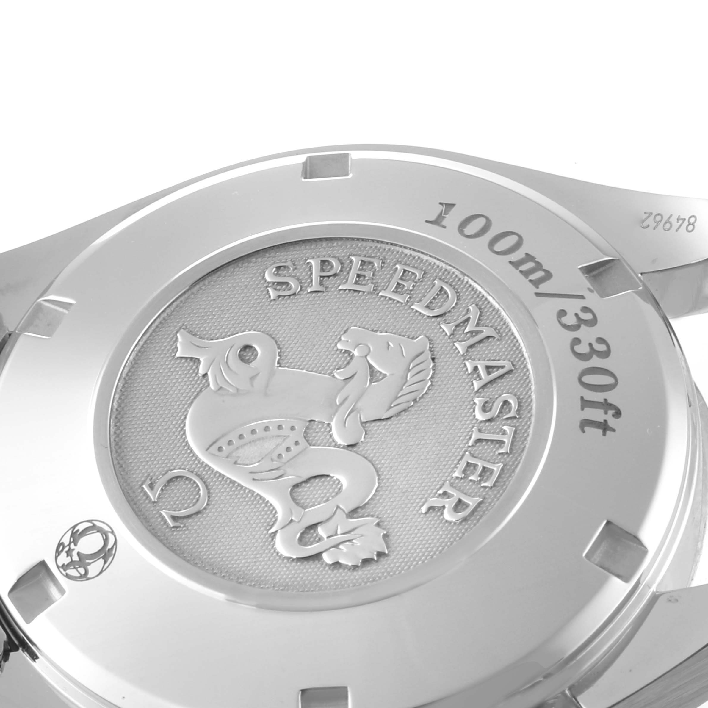 The image shows the back case of the Omega Speedmaster 323.30.40.40.06.001 Men's Stainless Steel Grey Dial 323.30.40.40.06.001 Men's Stainless Steel Grey Dial watch, displaying the model name, depth rating, and engraved emblem.