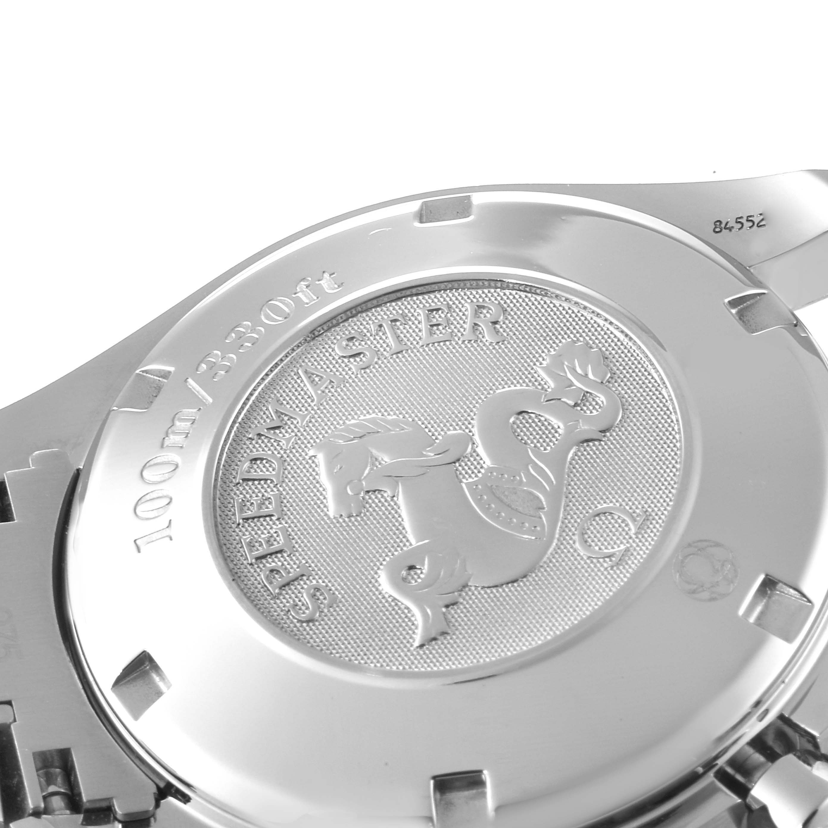 The image shows the case back of an Omega Speedmaster 3211.50.00 Men
s Stainless Steel Black Dial 3211.50.00 Men
s Stainless Steel Black Dial watch, highlighting its engravings and emblem.