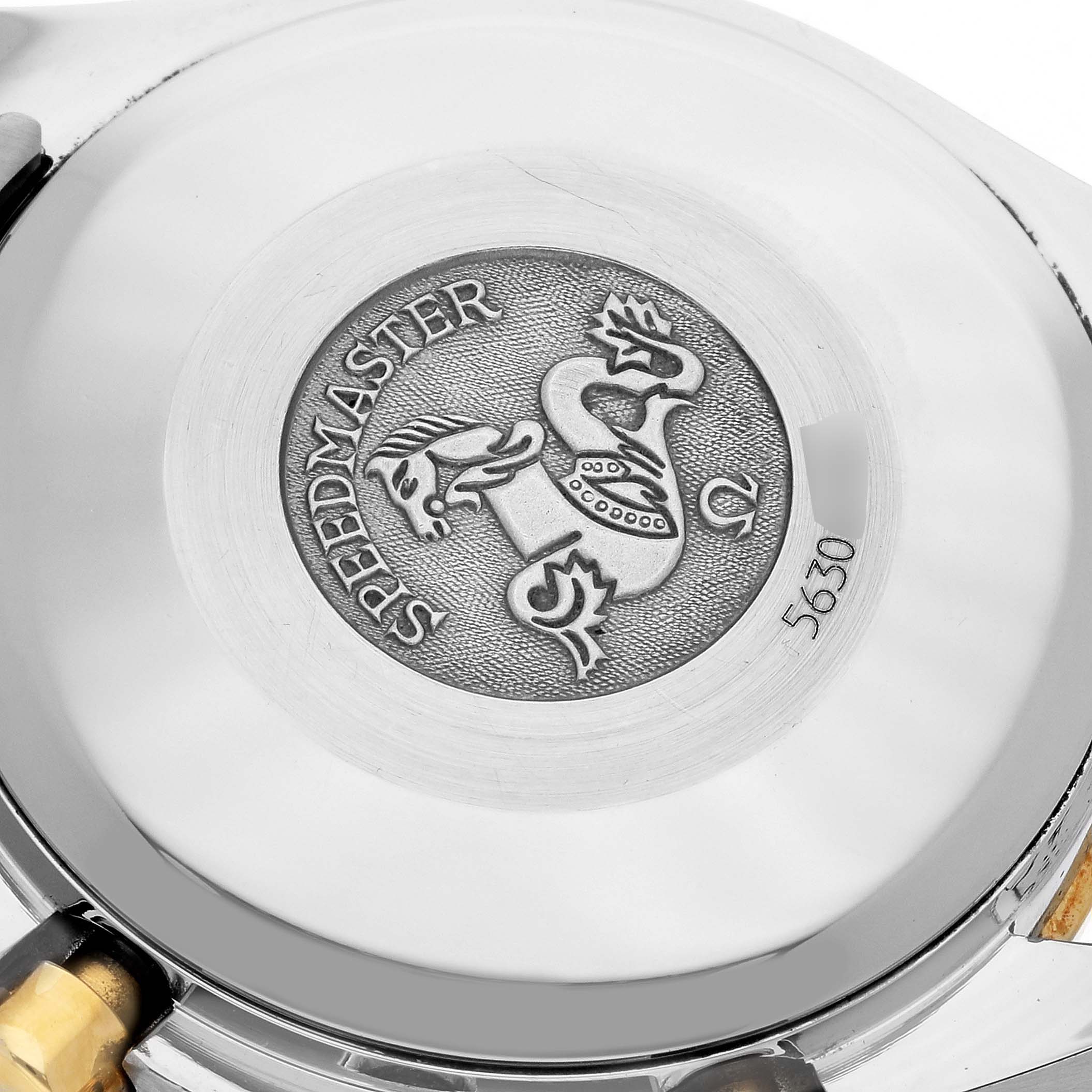 The image shows the engraved case back of an Omega Speedmaster 3313.33.00 Men's Steel and Gold (two tone) White Dial 3313.33.00 Men's Steel and Gold (two tone) White Dial watch.