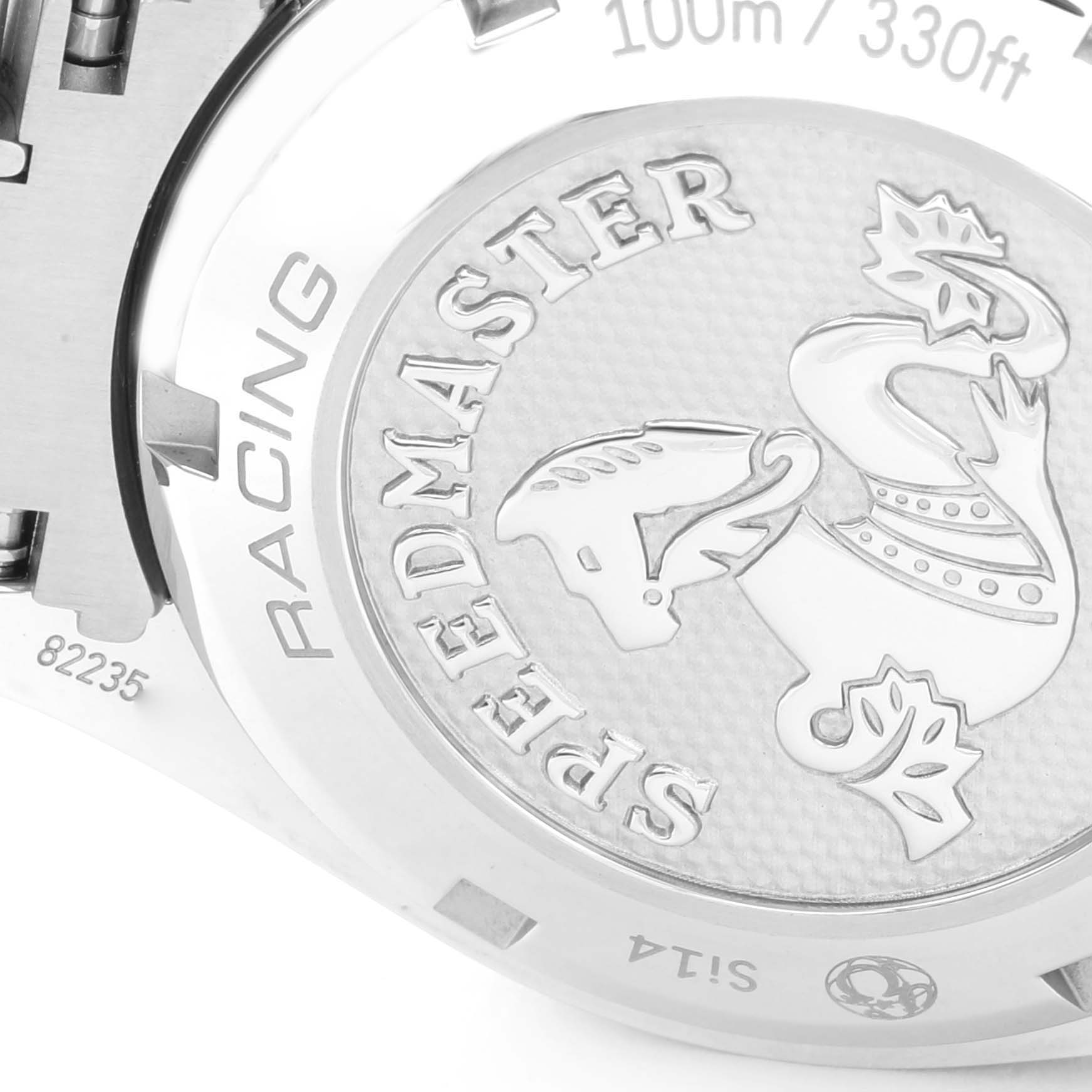 The image shows the back case of an Omega Speedmaster 326.30.40.50.03.001 Men
s Stainless Steel Blue Dial 326.30.40.50.03.001 Men
s Stainless Steel Blue Dial watch, including the "RACING" and "SPEDMASTER" inscriptions.