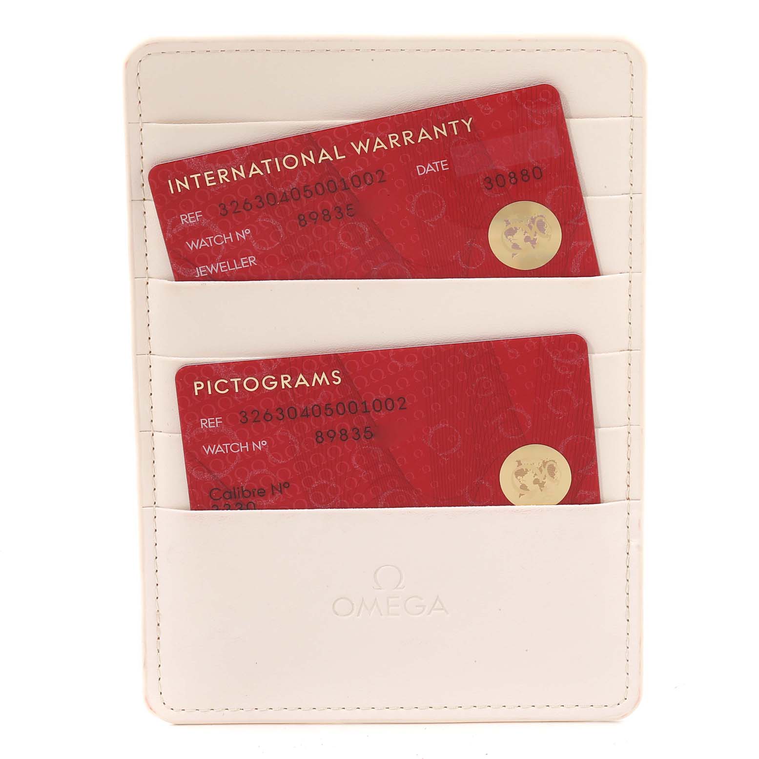 The image shows the international warranty and pictograms cards with a cardholder for the Omega Speedmaster 326.30.40.50.01.002 Men's Stainless Steel Black Dial 326.30.40.50.01.002 Men's Stainless Steel Black Dial model.