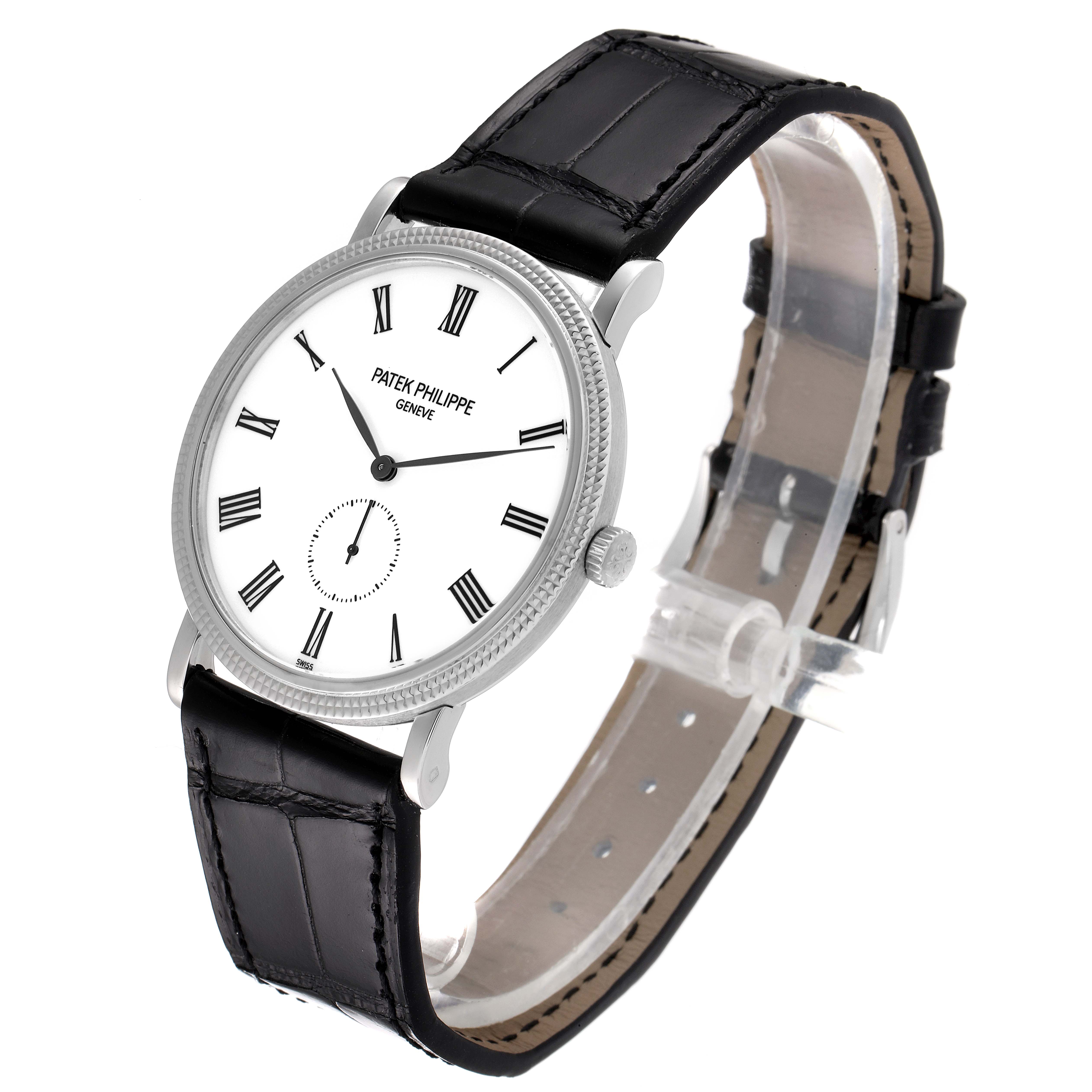 The Patek Philippe Calatrava 5119G Men
s White Gold White Dial 5119G Men
s White Gold White Dial watch is shown from an angled view, highlighting its face, strap, and side profile.
