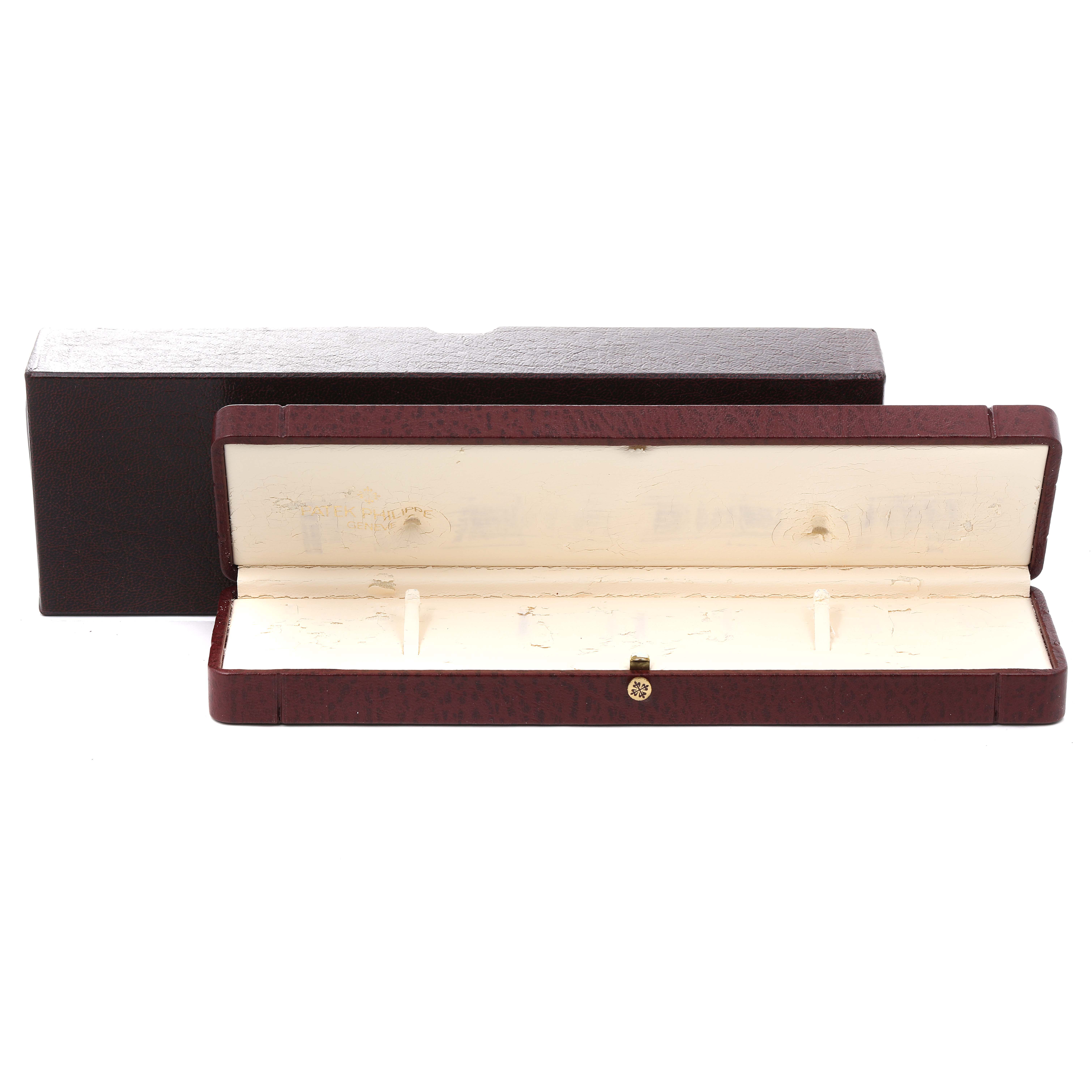 This image shows the open watch box for a Patek Philippe Calatrava 5120J Men's Yellow Gold White Dial 5120J Men's Yellow Gold White Dial model, with the interior and exterior of the box visible.