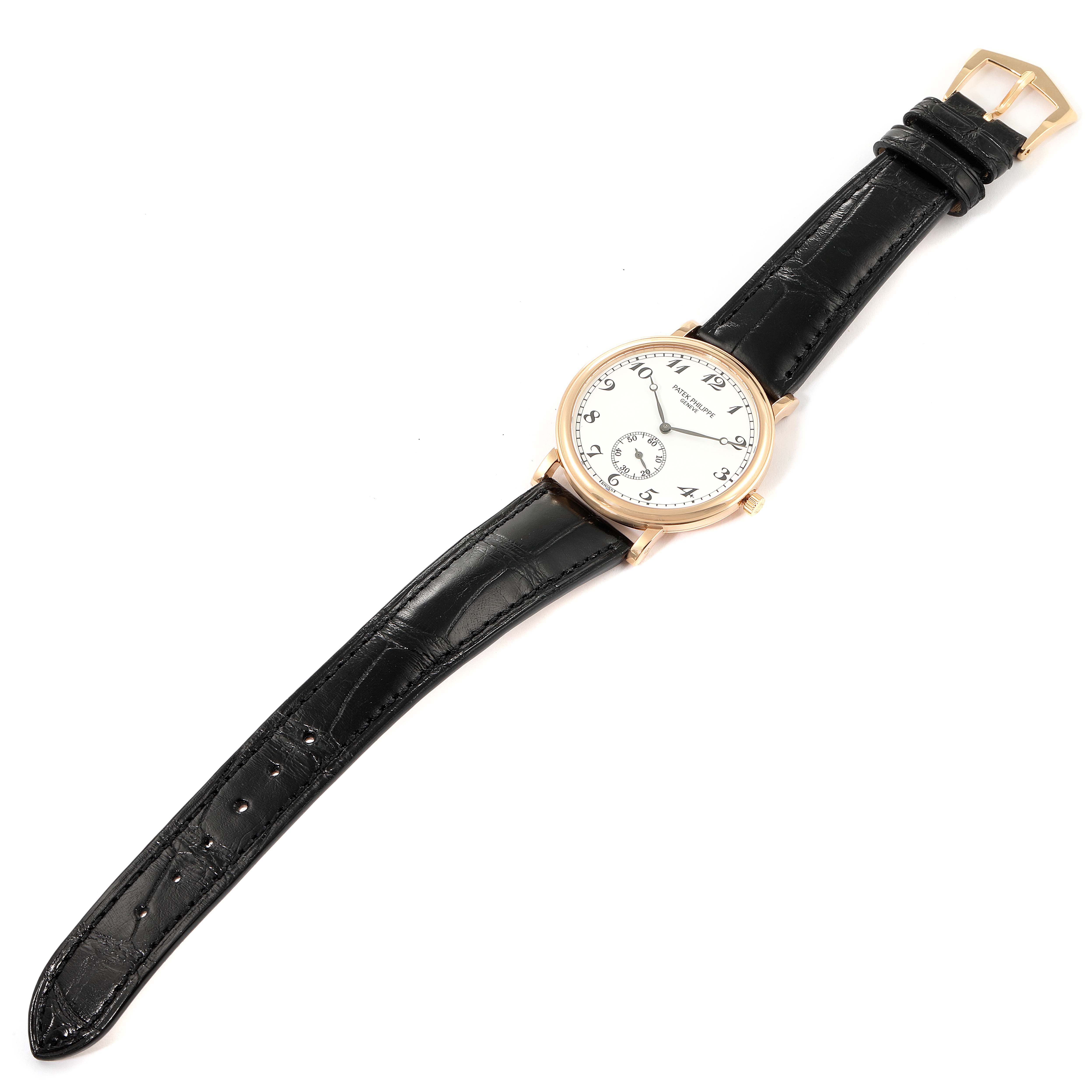 This image shows a Patek Philippe Calatrava 5022R Men
s Rose Gold White Dial 5022R Men
s Rose Gold White Dial watch laid flat, displaying the face, black leather strap, and gold buckle.