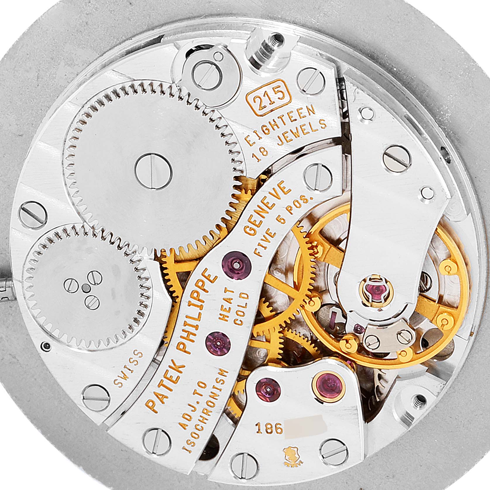 This image shows a close-up view of the movement mechanism of a Patek Philippe Calatrava 5022R Men
s Rose Gold White Dial 5022R Men
s Rose Gold White Dial watch.